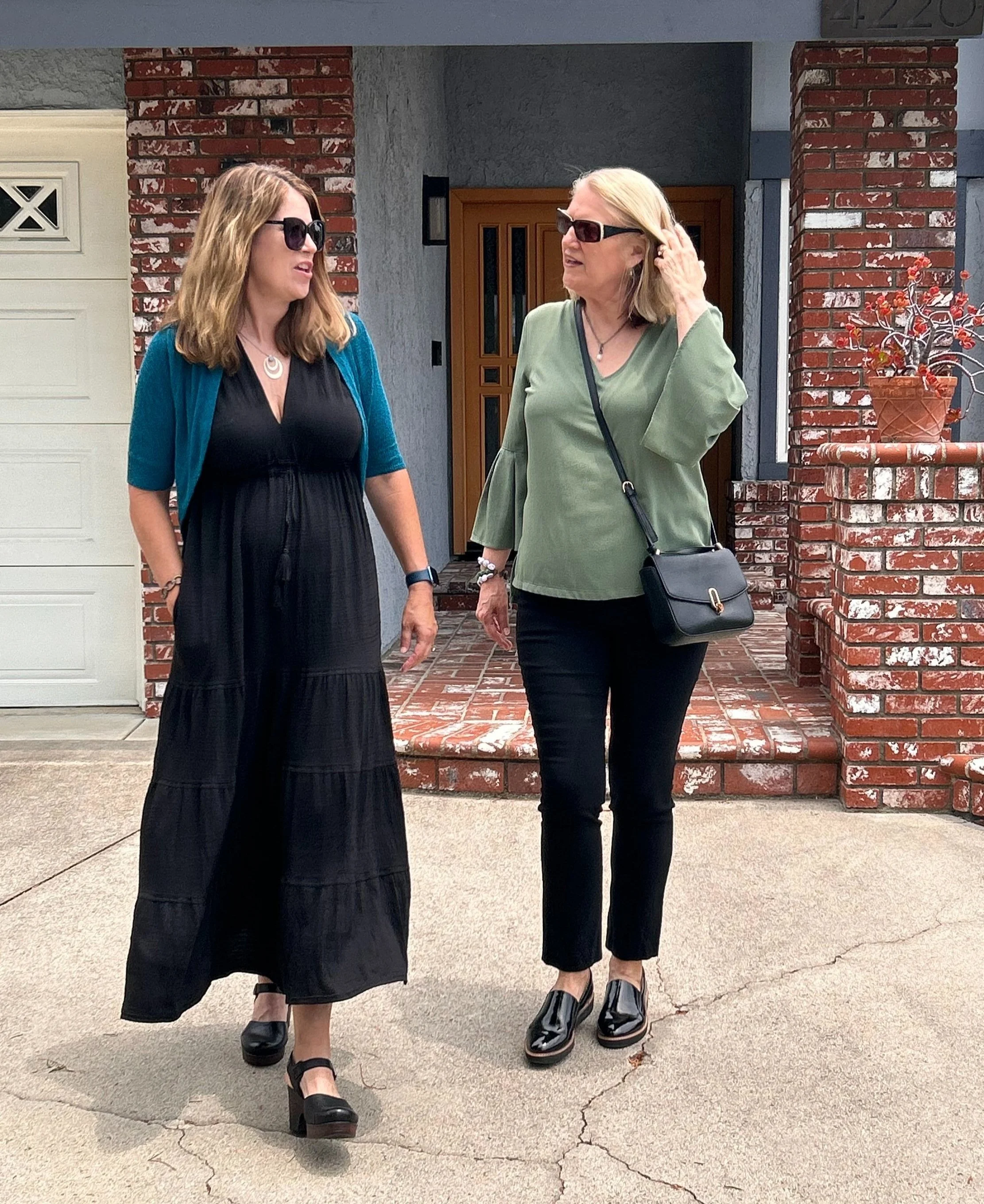 wear summery layers to a Summer funeral with flowing dress and light sweater. neutral earth tones are ok to wear to a Summer funeral