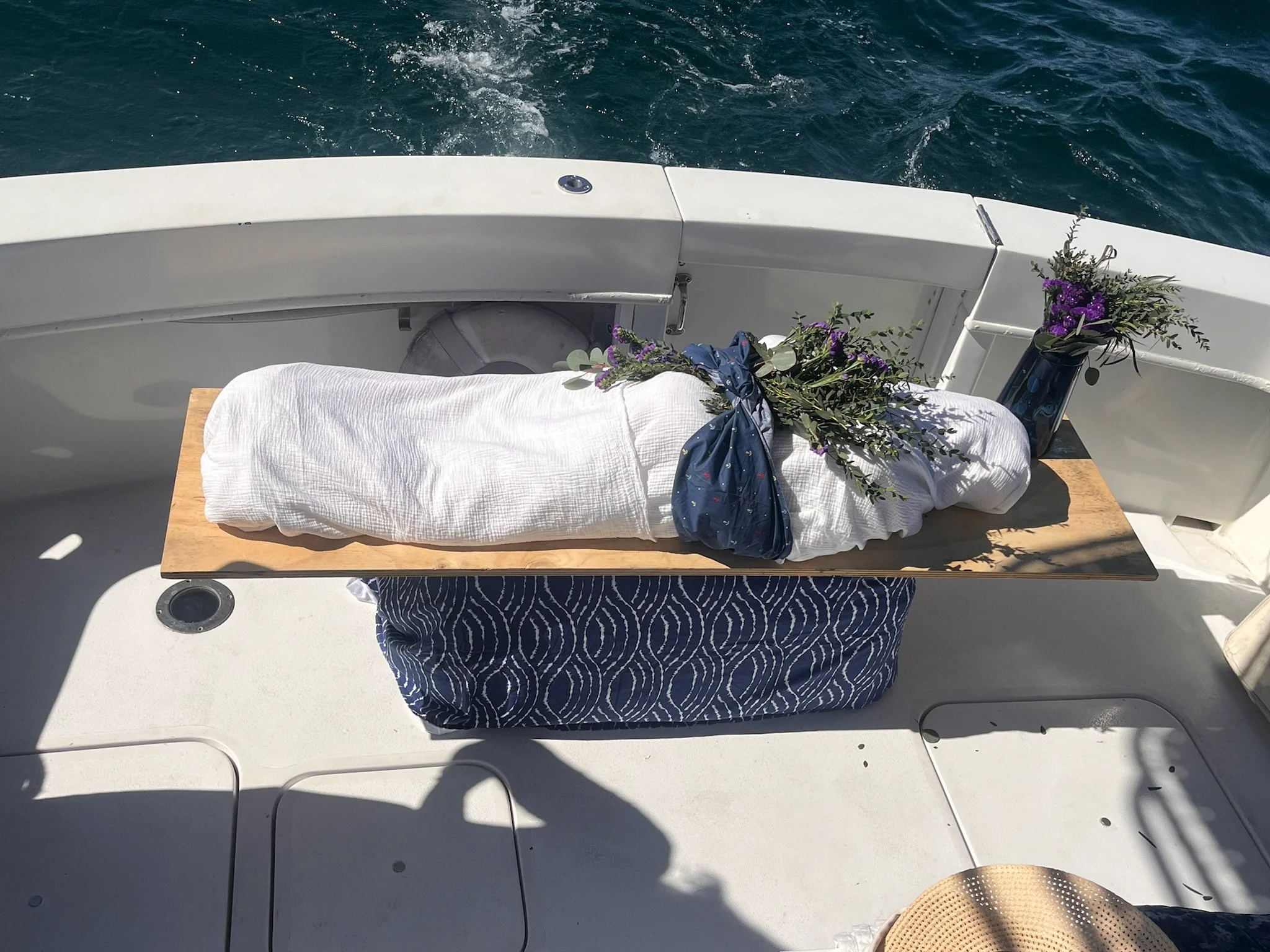 A person is shrouded for burial at sea off the coast of San Diego CA