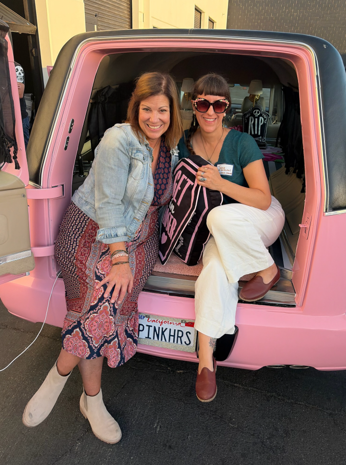 Penny and Tara hang out in the pink hearse and look super cute! 