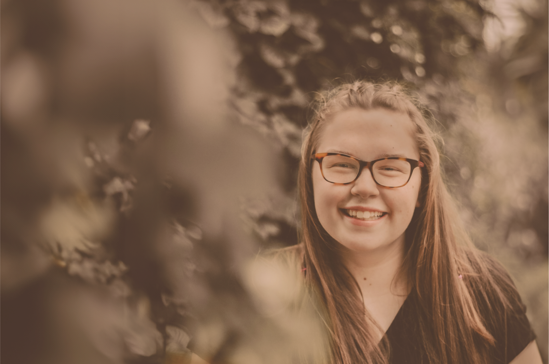 An adoptive youth smiling