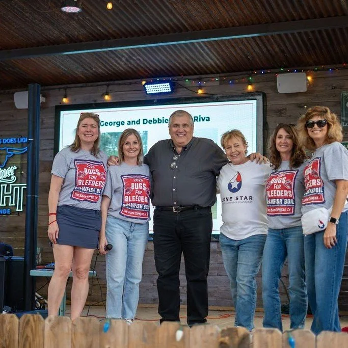 The de la Riva family being recognized on stage with Lone Star volunteers