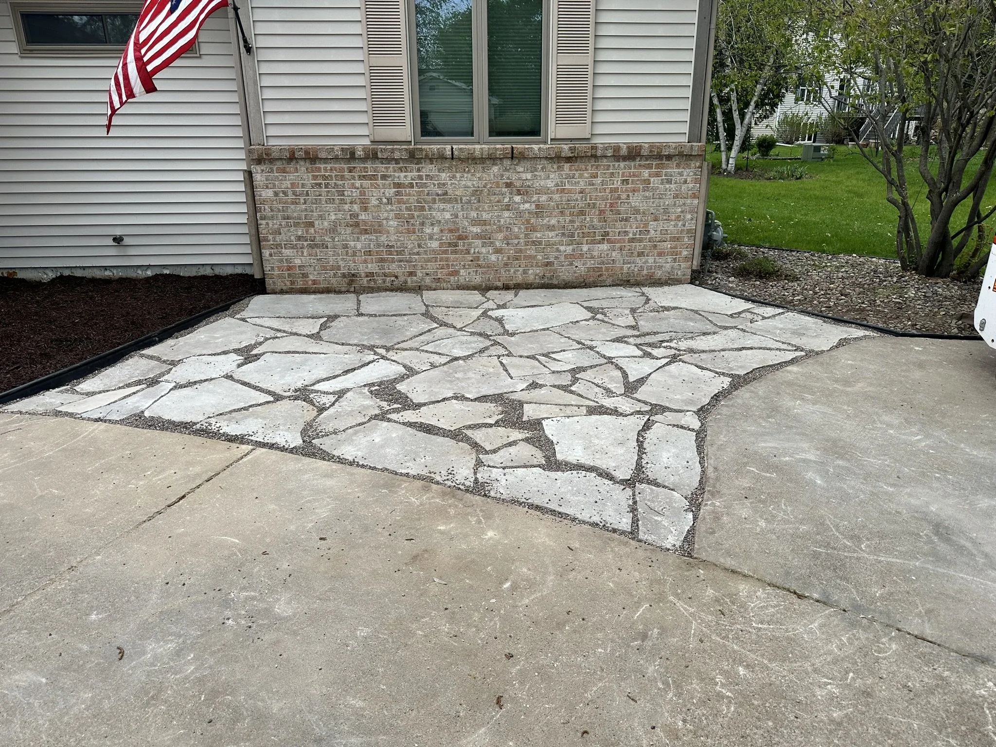 Flagstone Patio &amp; Landscape Beds — Middleton, WI
