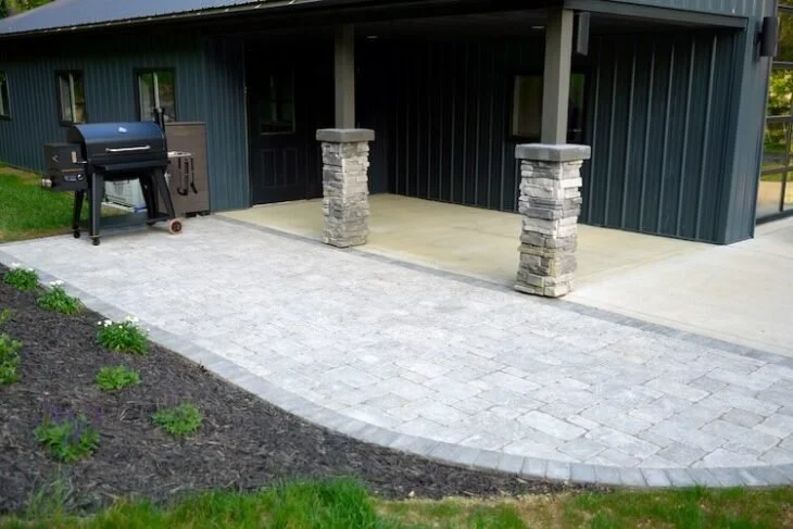 paver patio with soldier course installed in Madison, WI by YD Exterior Visions hardscaping service team.