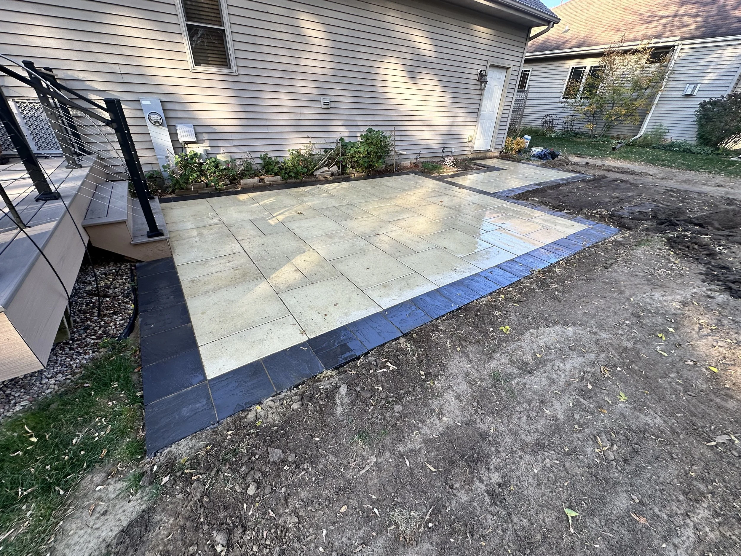 Paver Patio built with antique travertine pavers by YD Exterior visions in fitchburg, WI. This patio was constructed by a skilled team of hardscapers.