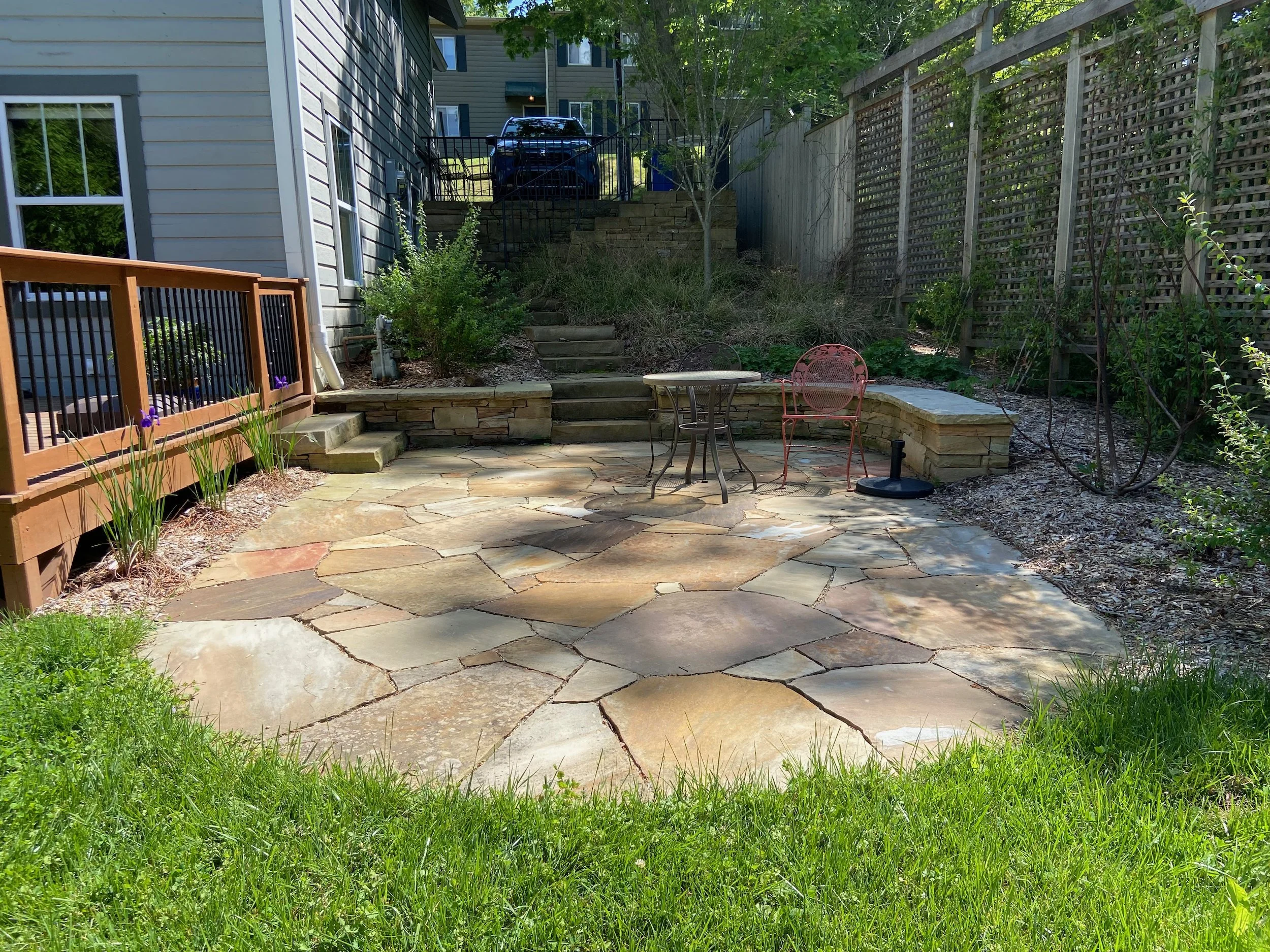 circular flagstone patio installed by YD Exterior Visions hardscaping service team in madison, wi