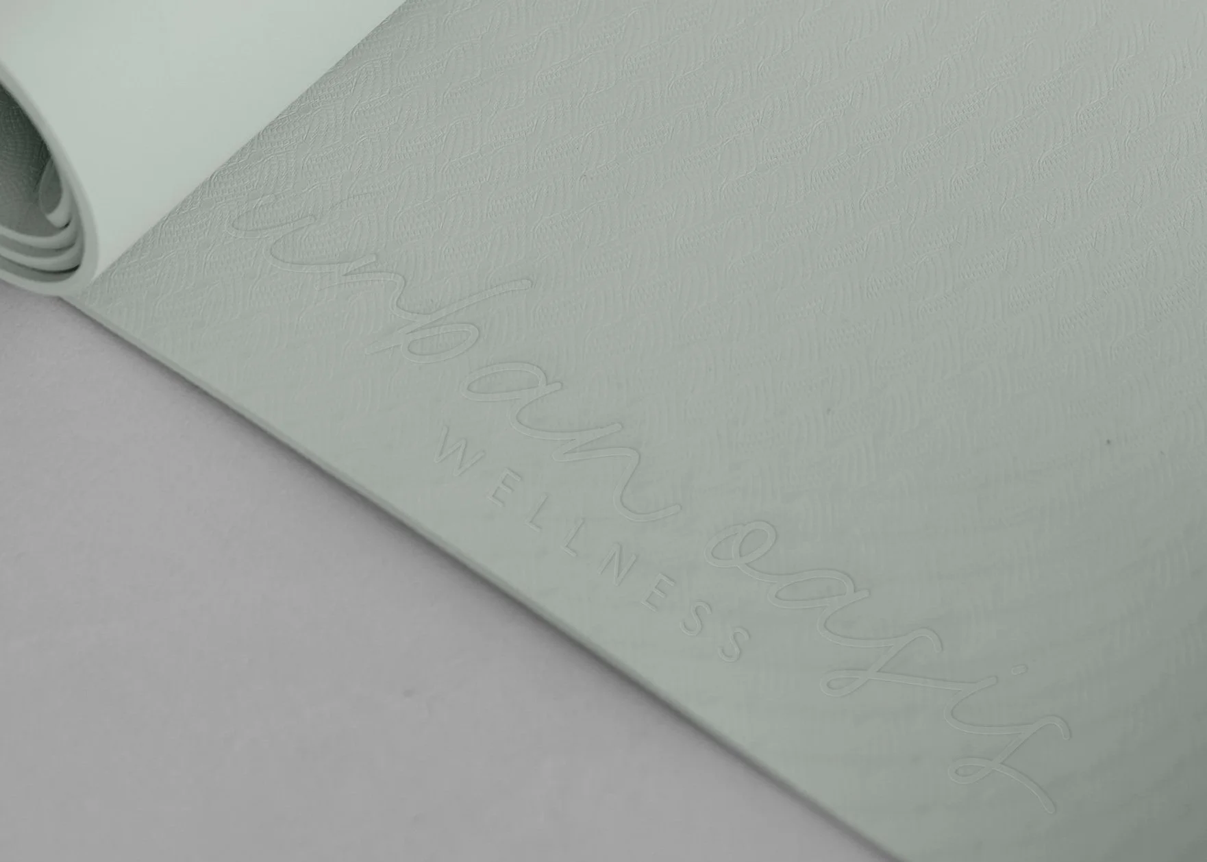 Urban-Oasis-Wellness-Yoga-Mat-Logo-Design-Mockup.jpg