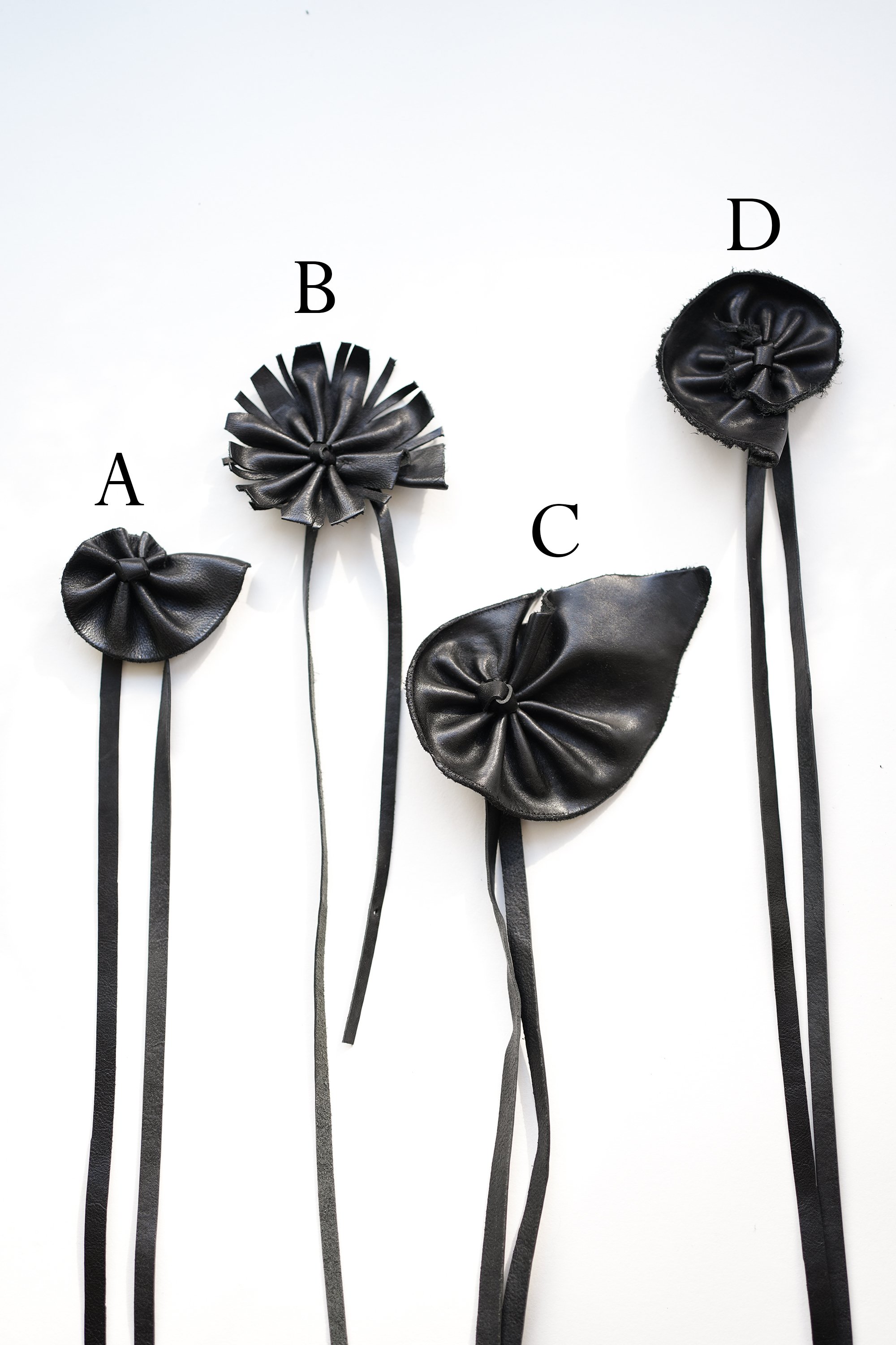 Marie-Bernadette-Woehrl-leather-flower-necklace-on-a-string-handmade-unique-piece-artisanal-antwerp-5.jpg