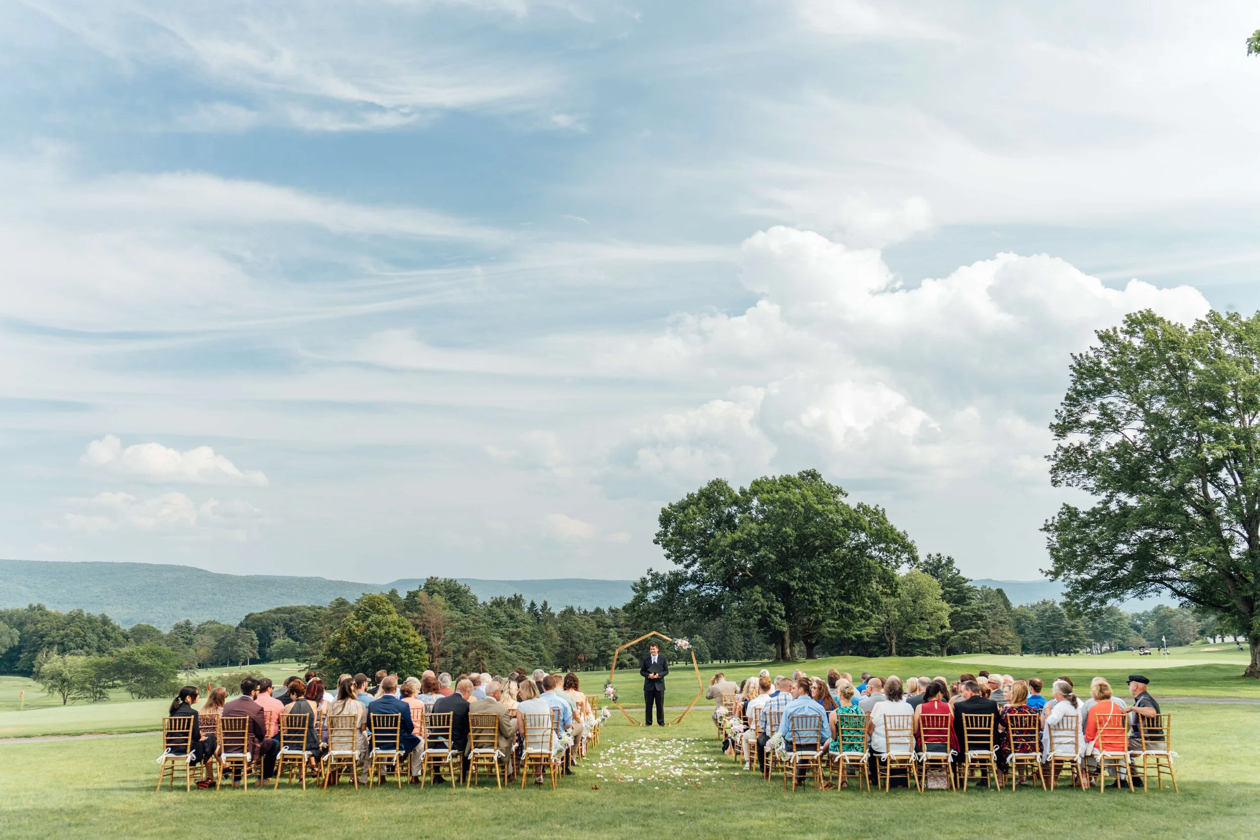 Wide view of an outdoor wedding ceremony in the Berkshires of Massachusetts.