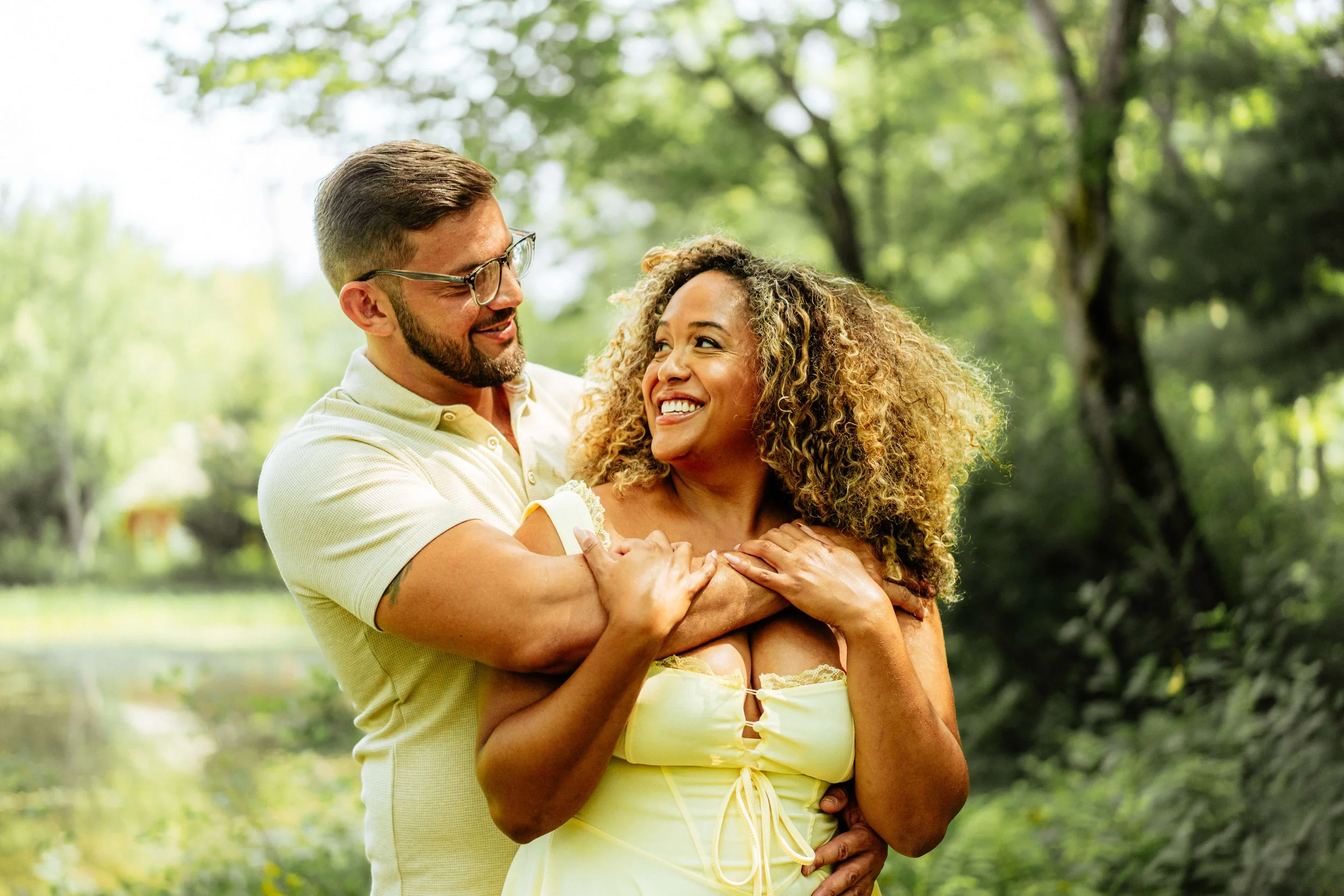 Romantic couple looking at each other during a scenic New Hampshire couples photography session.