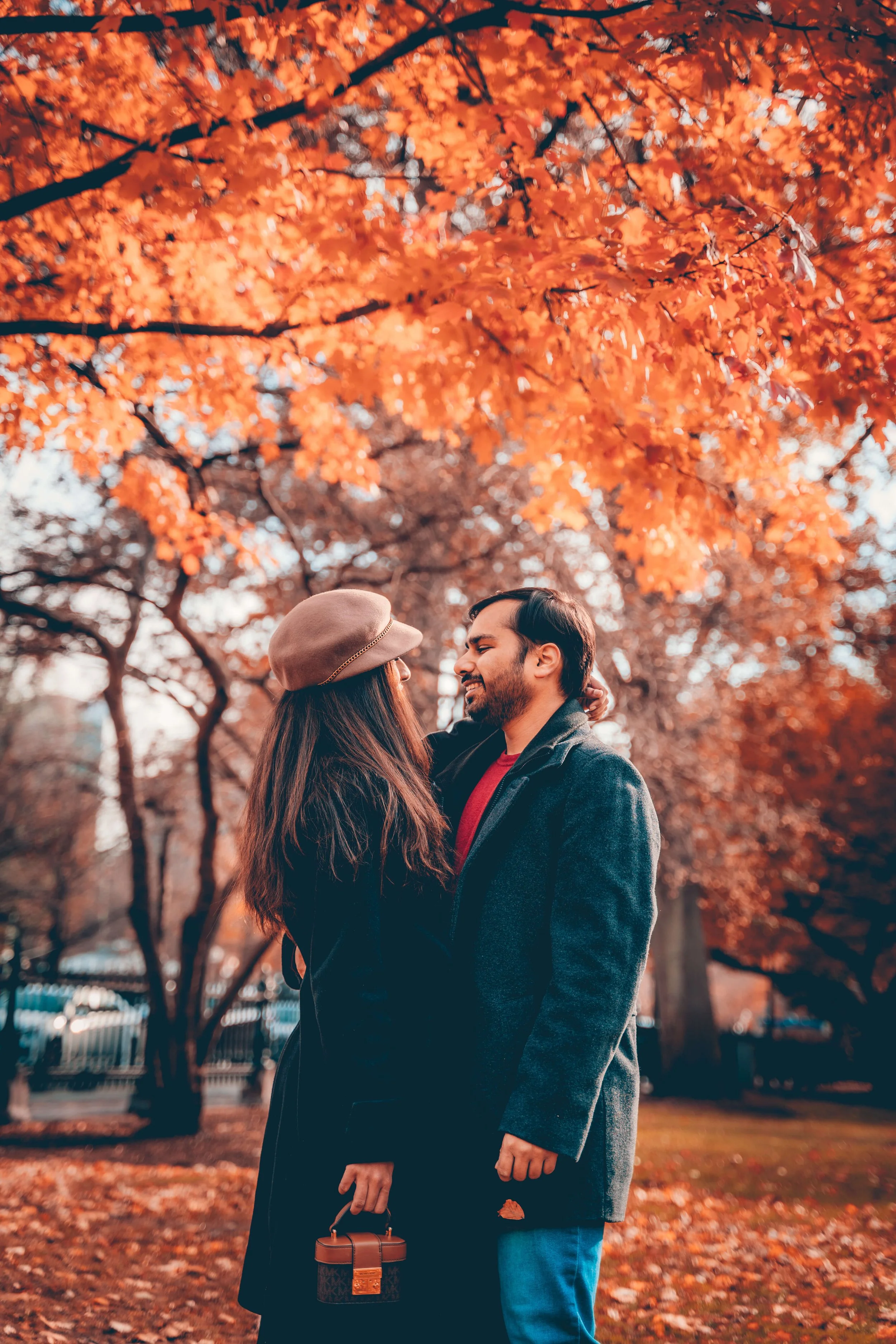 Romantic couple portrait during an autumn couples session in Boston Public Garden.