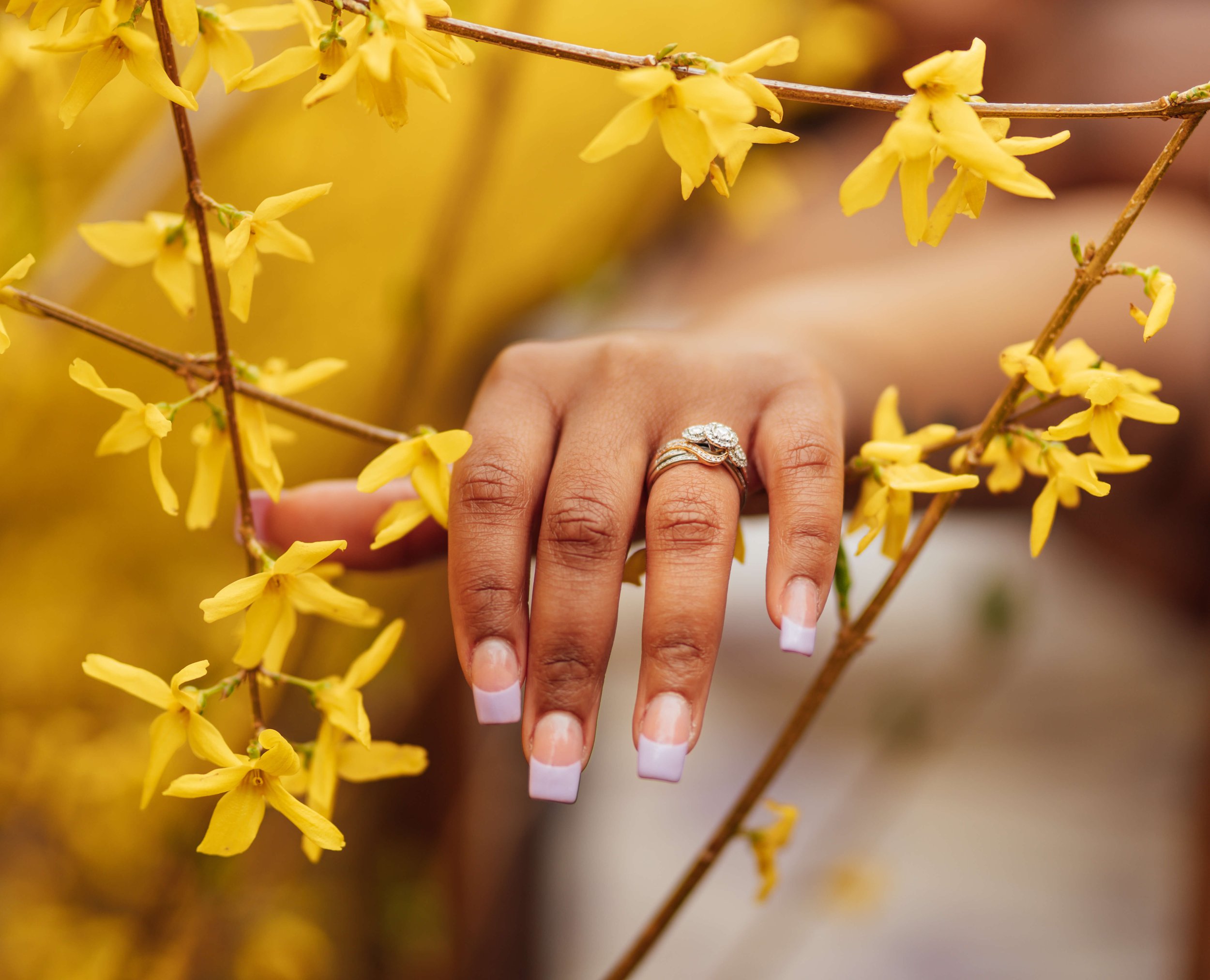 Close up engagement ring detail during spring proposal in Bosto