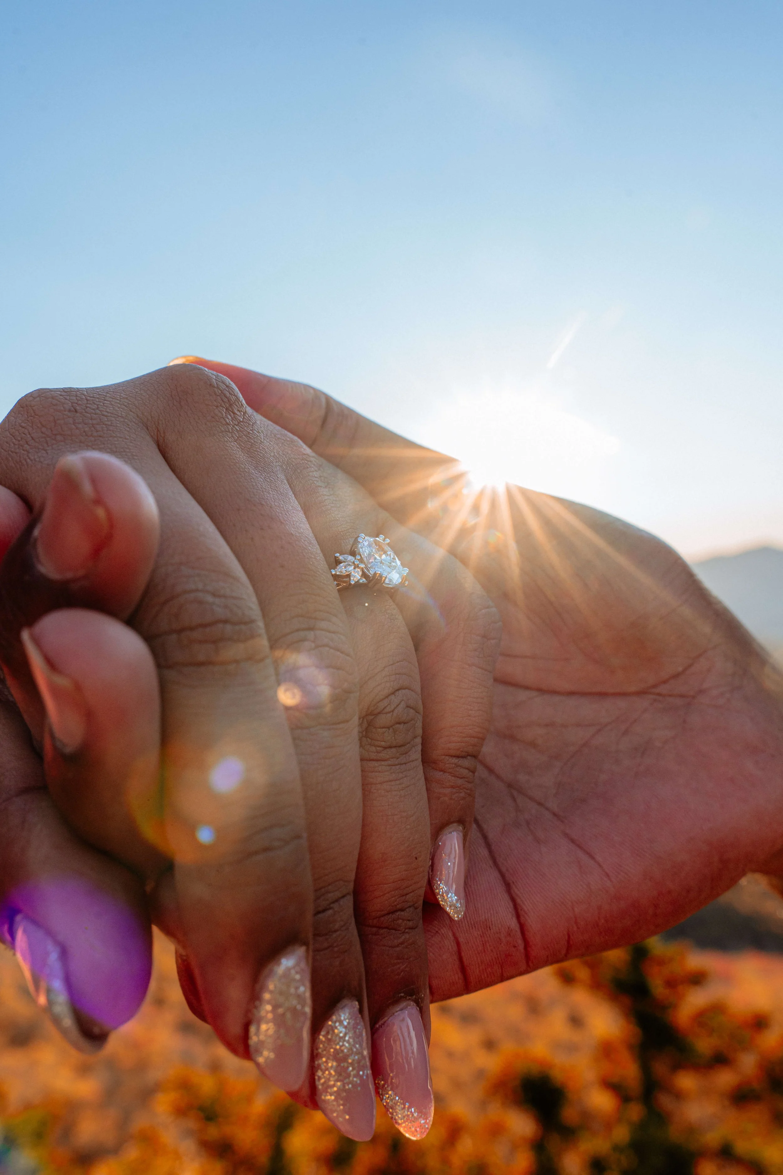 Engagement ring detail during fall proposal in Vermont mountains