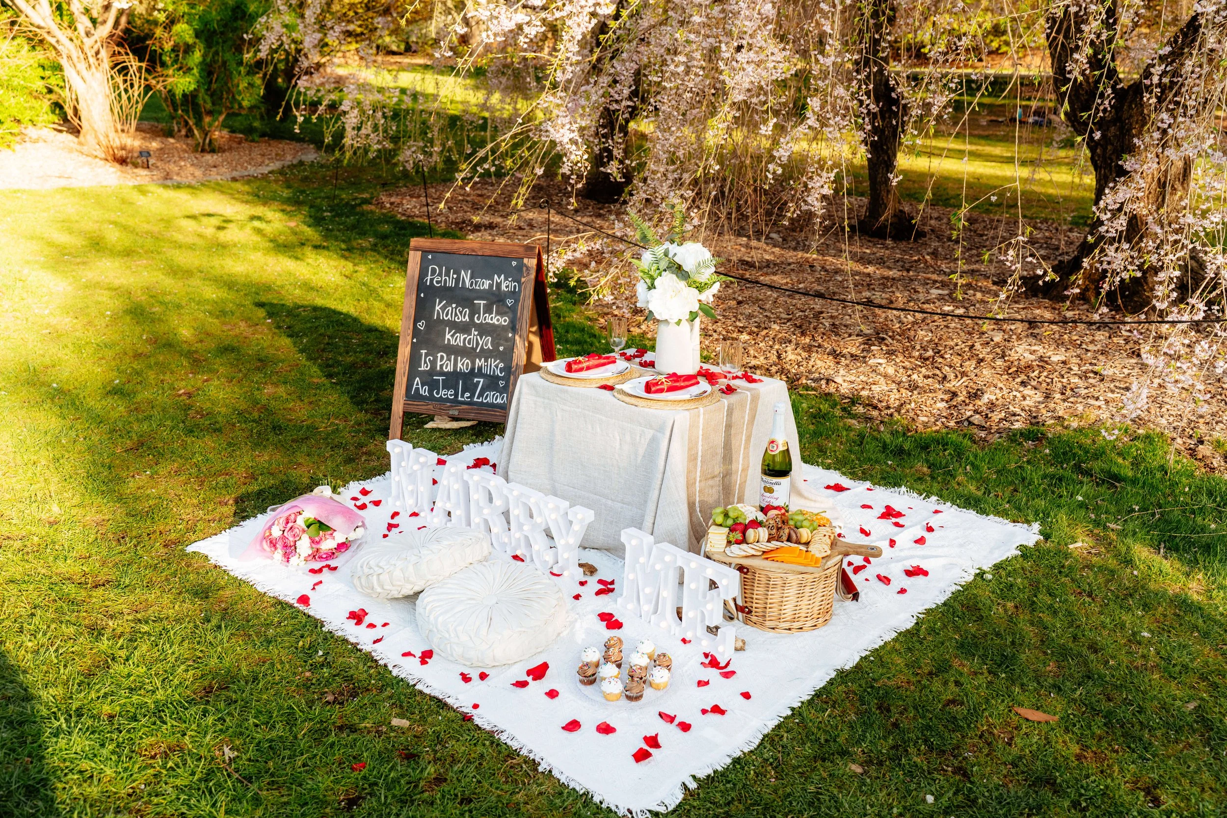 Romantic Boston proposal setup with candles and decorations