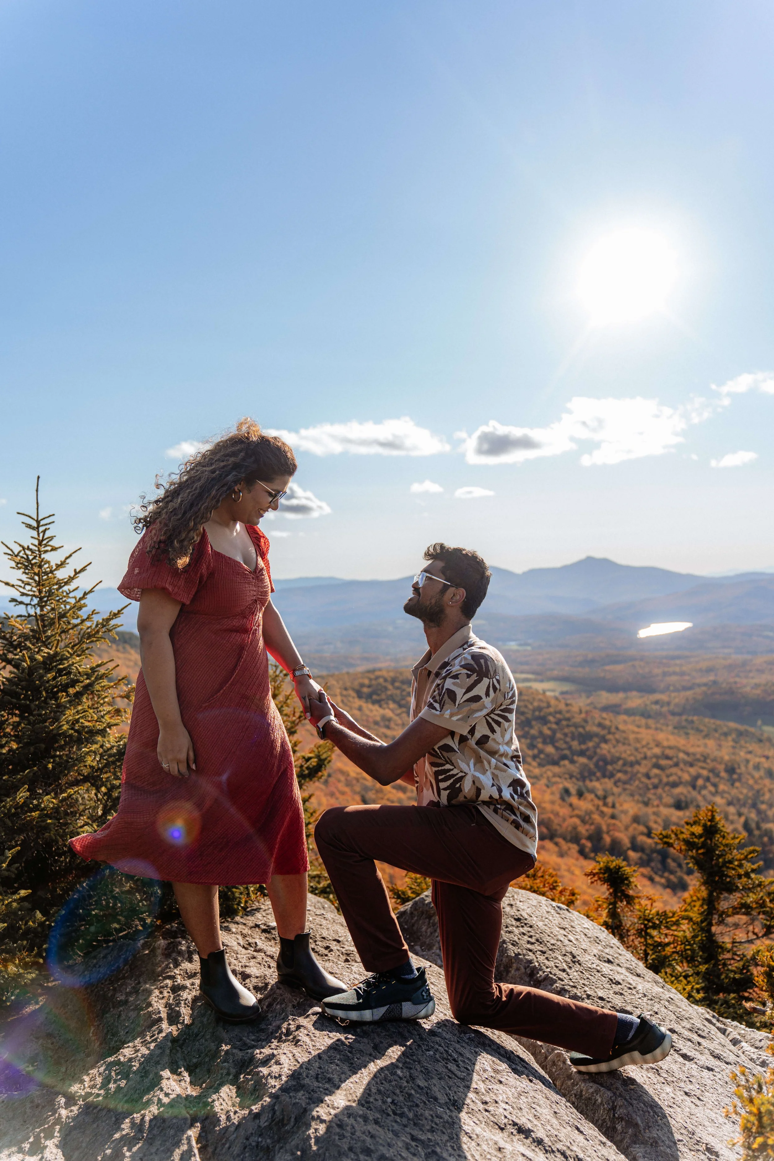 Mountaintop fall surprise proposal in Vermont scenic landscape