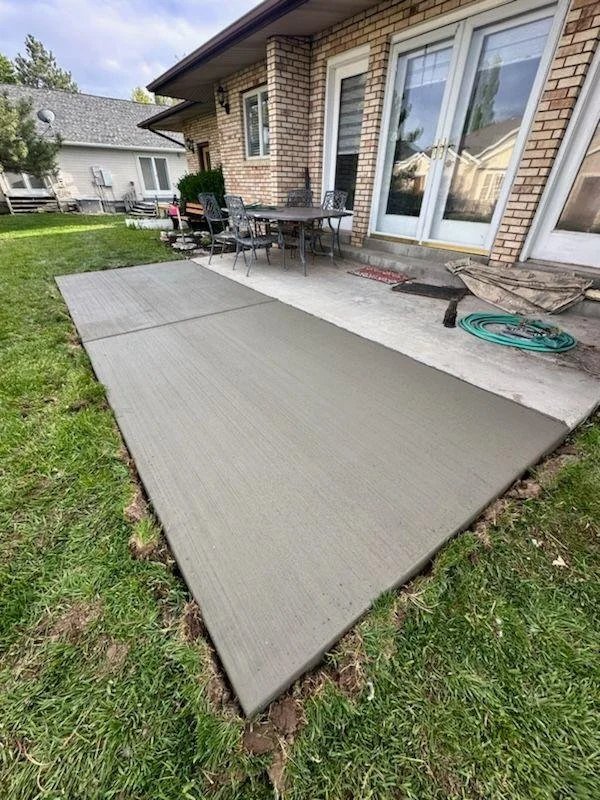 After photo of concrete patio in Magna