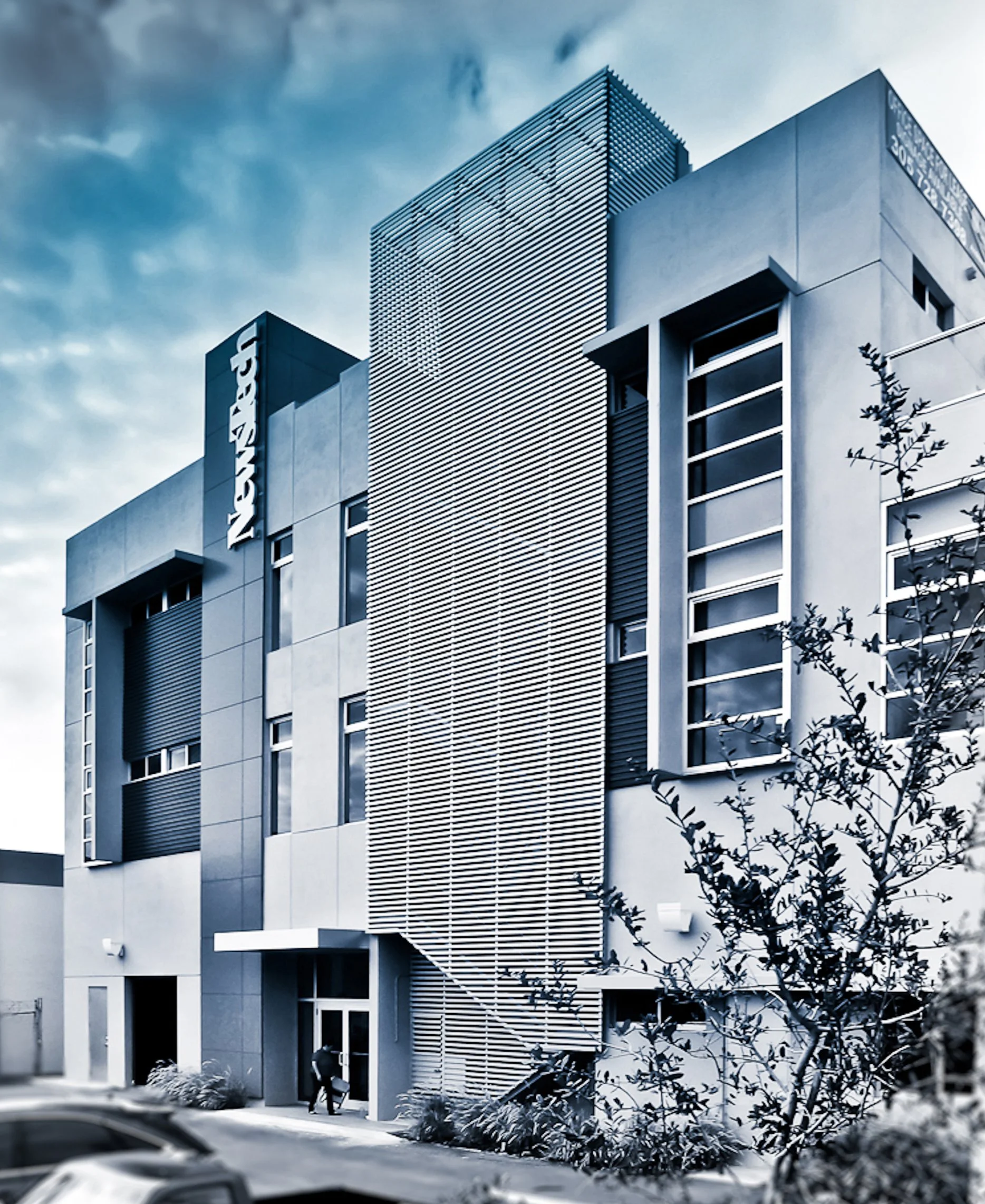 Front view of 3-story mixed used building in Miami, Florida.