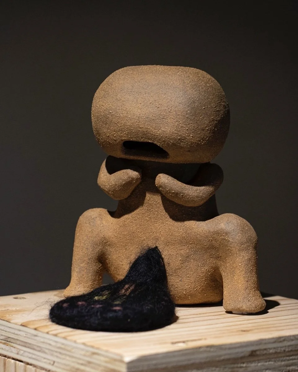 Oversharing; 2024; ceramic stoneware, felted wool  
5” x 4” x 6"