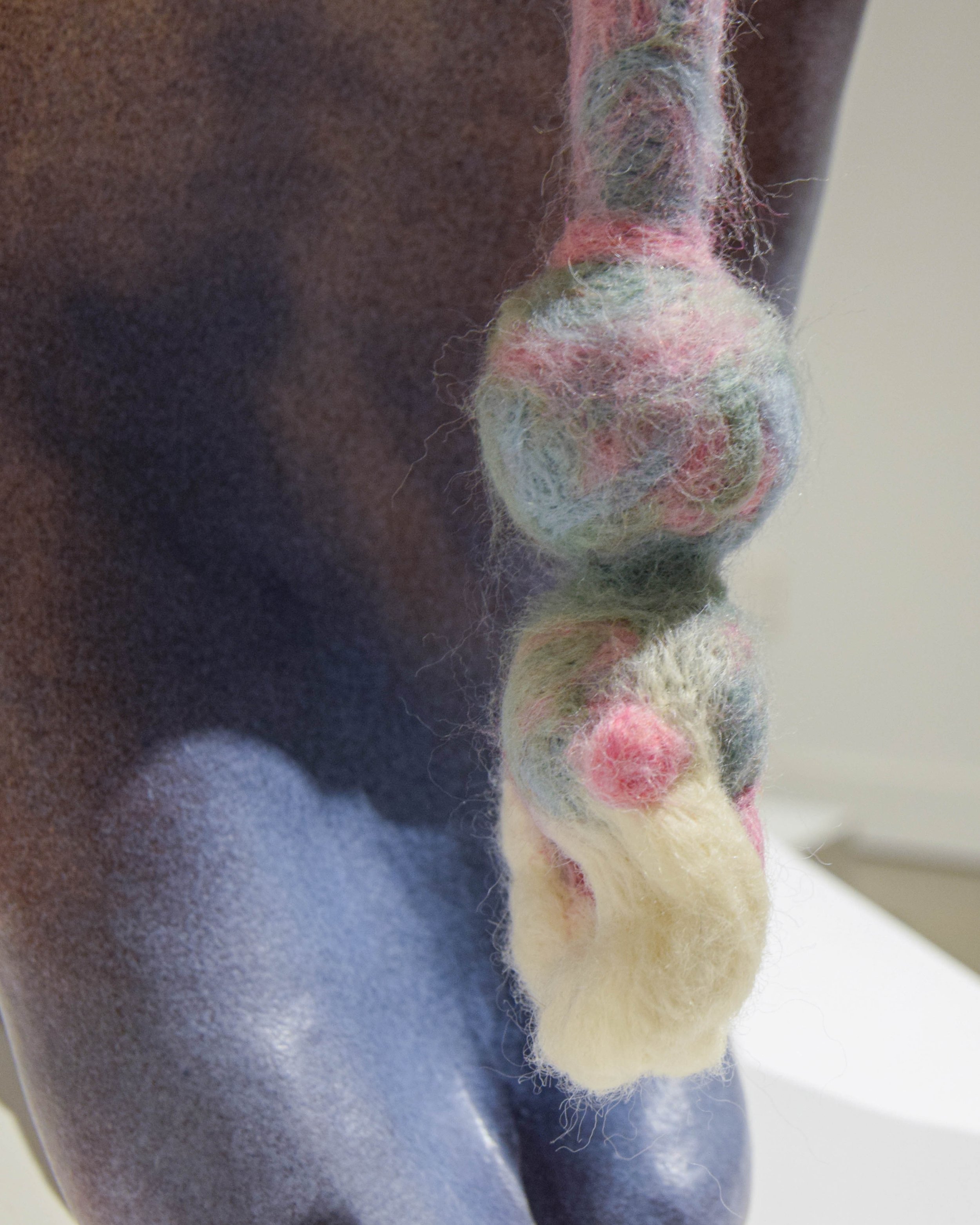 Balance (detail); 2024; ceramic stoneware, glaze, wool 
14” x 8” x 13”