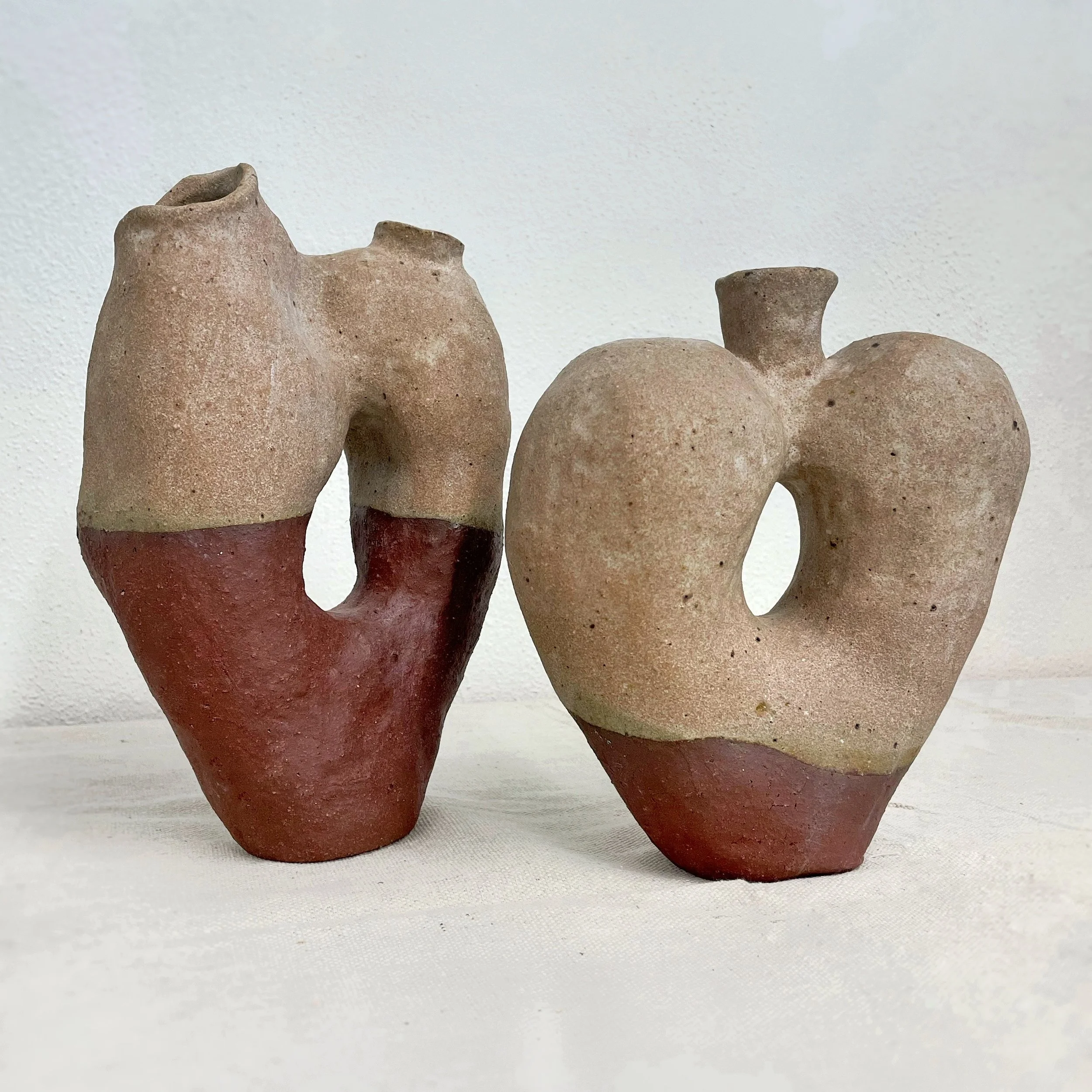 Heart Vase Pair; 2024; ceramic stoneware, glaze  
6" x 3" x 8" // 6" x 3" x 9"