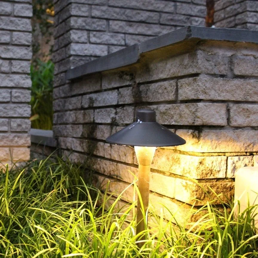 How to Add Lighting and Decorative Features to Retaining Walls