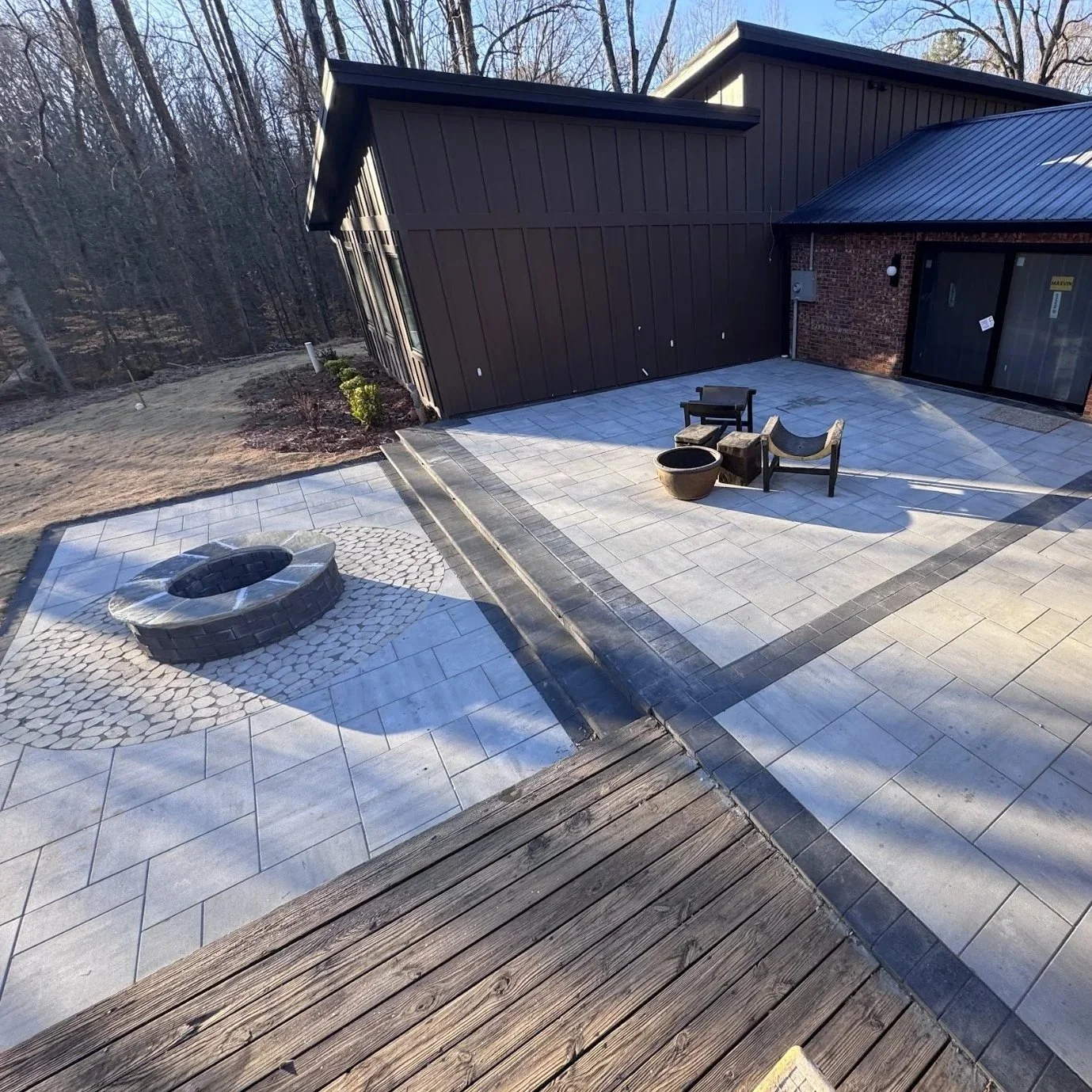 Transform your Gainesville backyard with a stylish fire pit—perfect for year-round outdoor relaxation, gatherings, and cozy evenings.