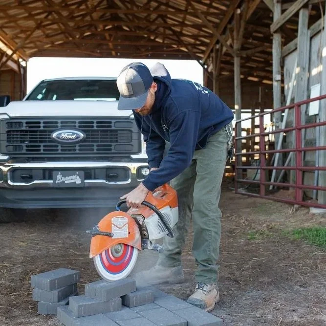 Building a retaining wall in Gainesville, GA, often seems like a budget-friendly weekend task, but North Georgia’s unique red clay and hilly terrain can quickly turn a DIY project into a financial sinkhole.