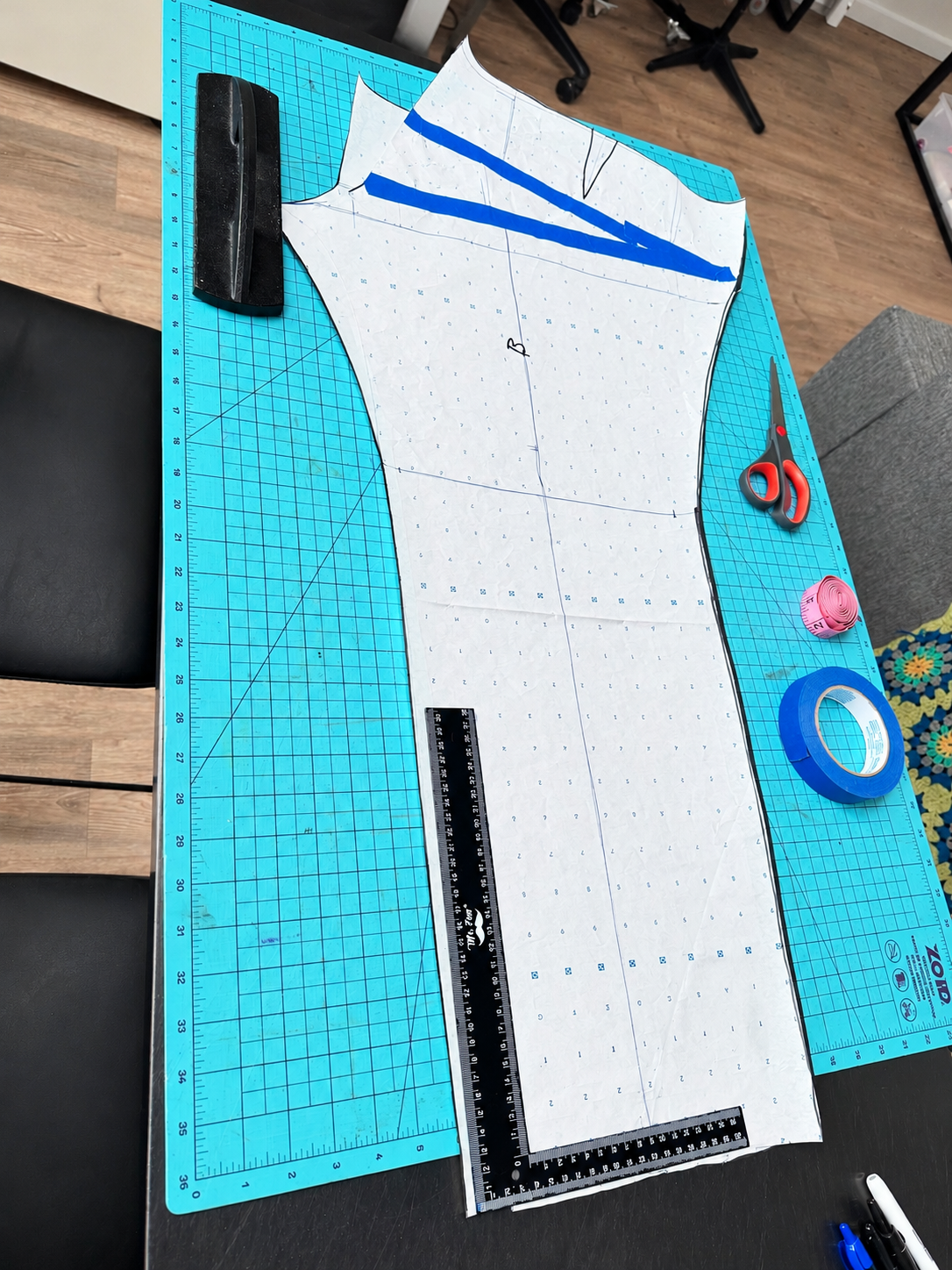 Sewing Pattern on Teal Cutting Mat.png