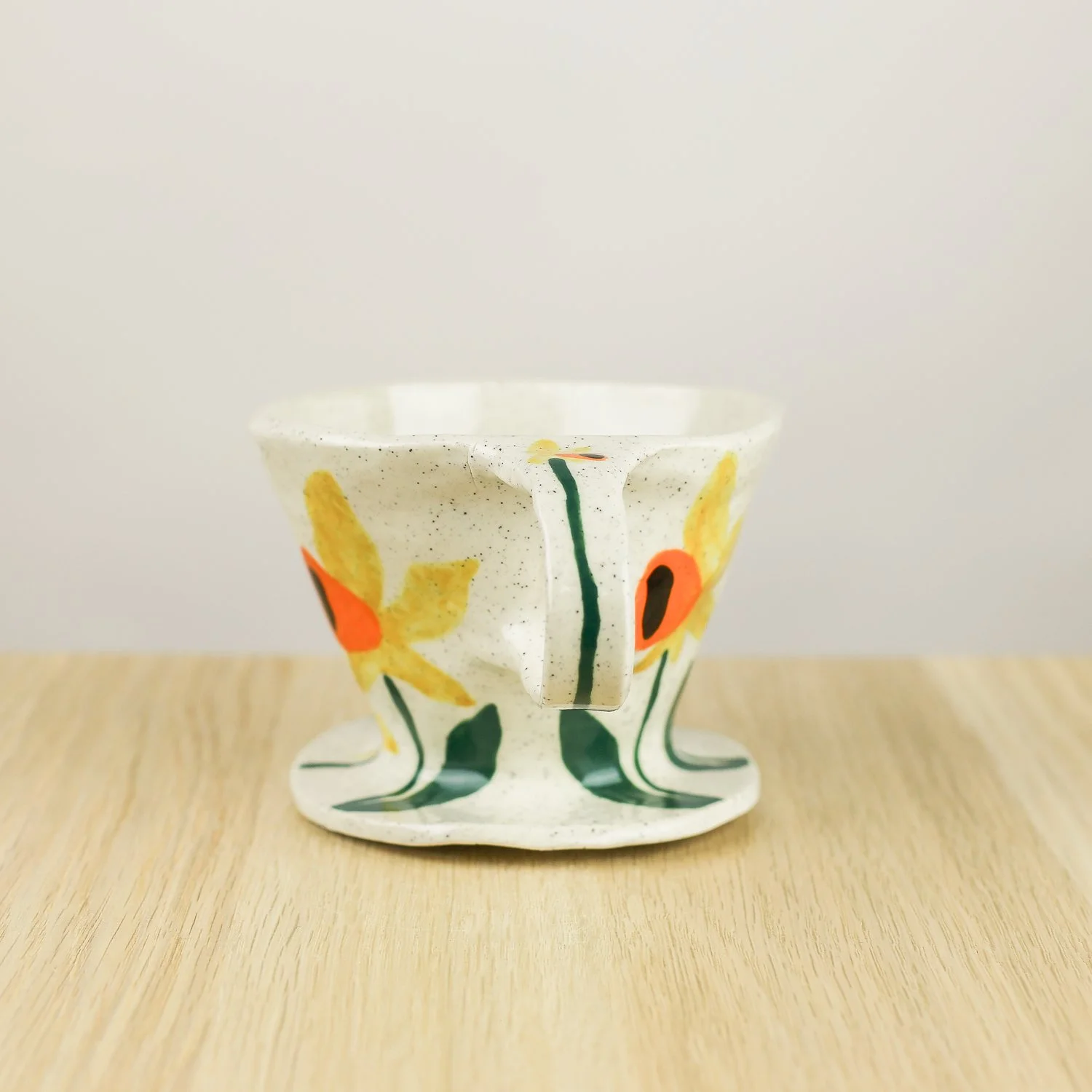 Handmade ceramic coffee dripper with daffodil flowers in yellow and green, pour over coffee maker by hellomae