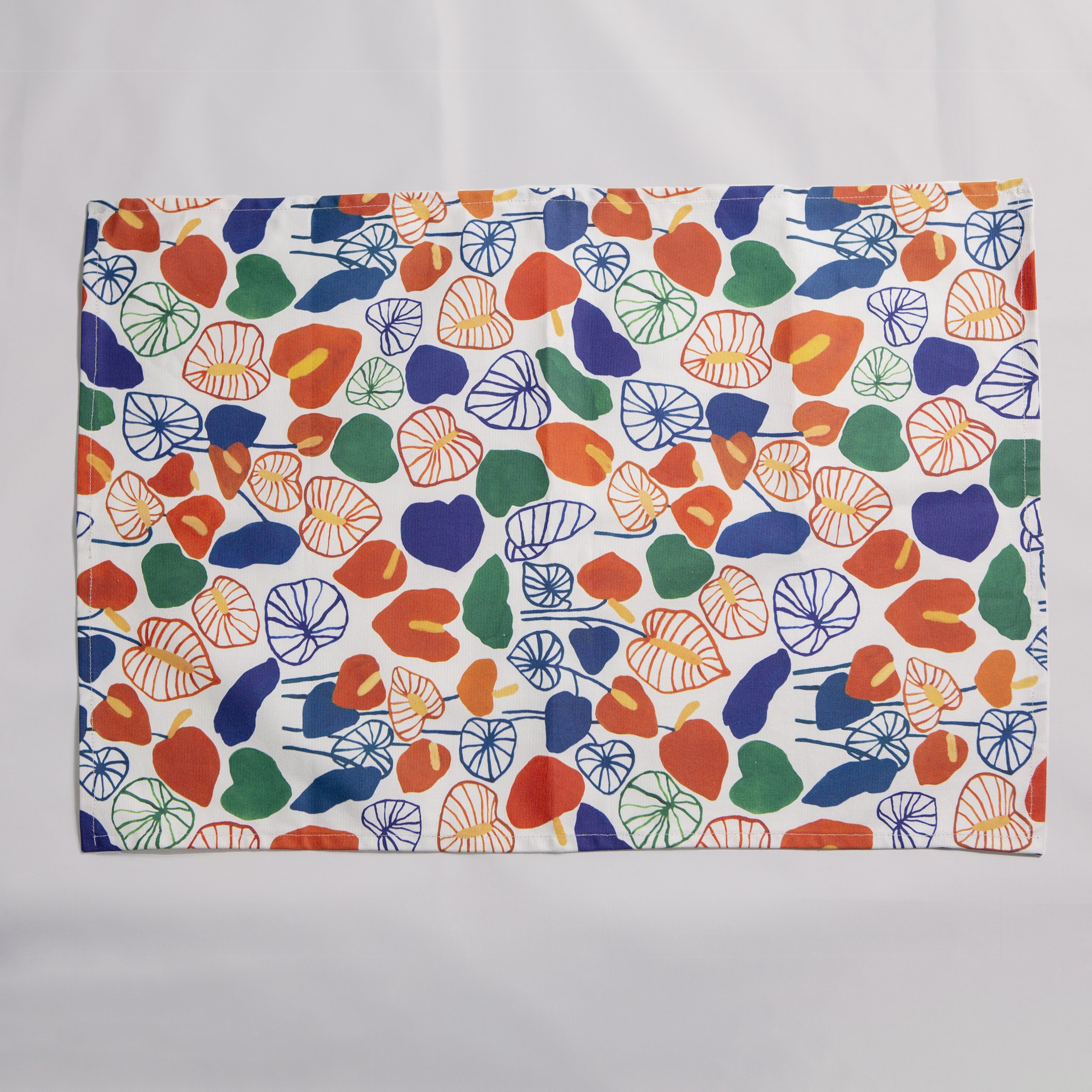 Cotton tea towel featuring a hand-drawn anthurium flower print by hellomaë. digitally printed and made in melbourne