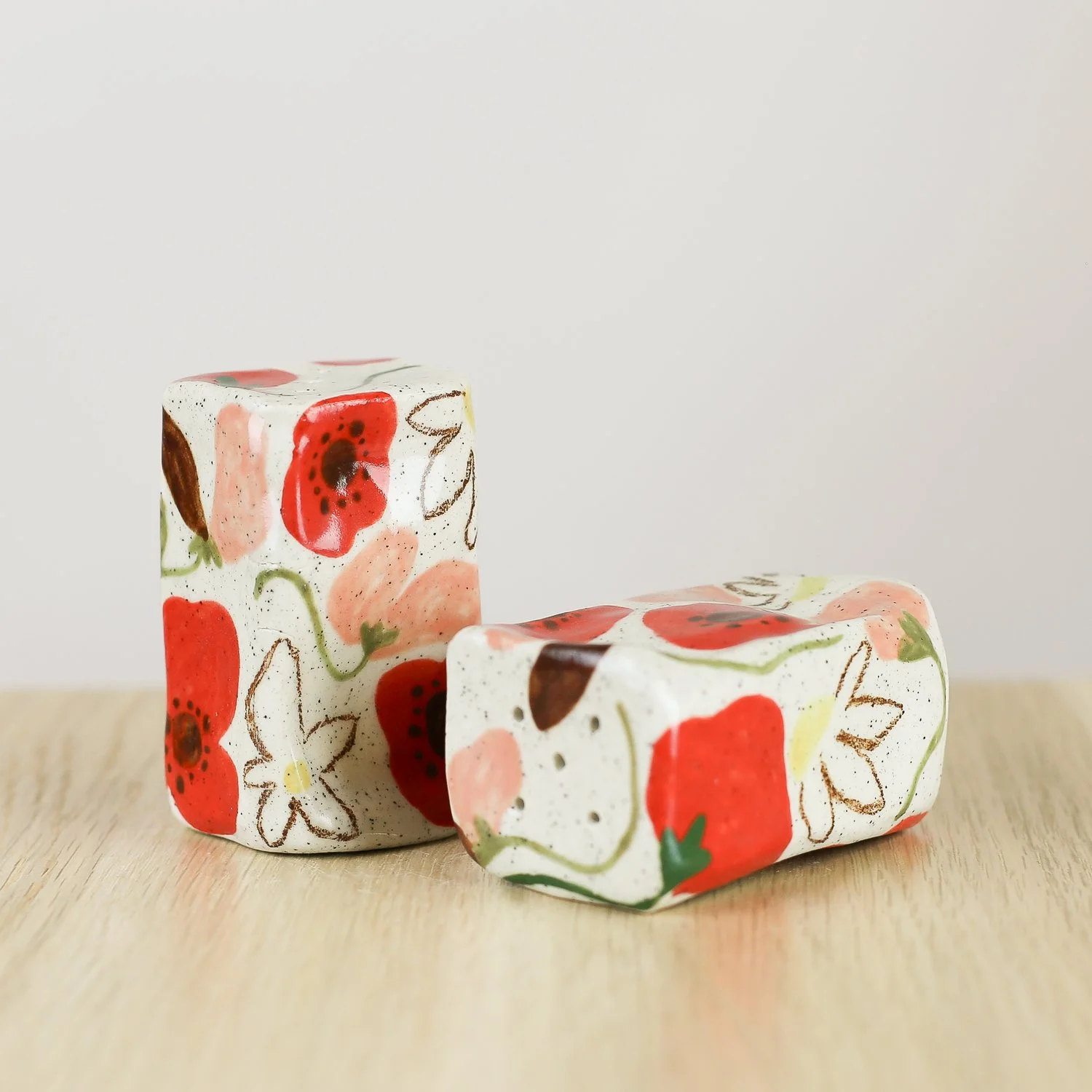 Handmade ceramic salt and pepper shaker set with poppies daisies and sweet pea flowers by hellomae