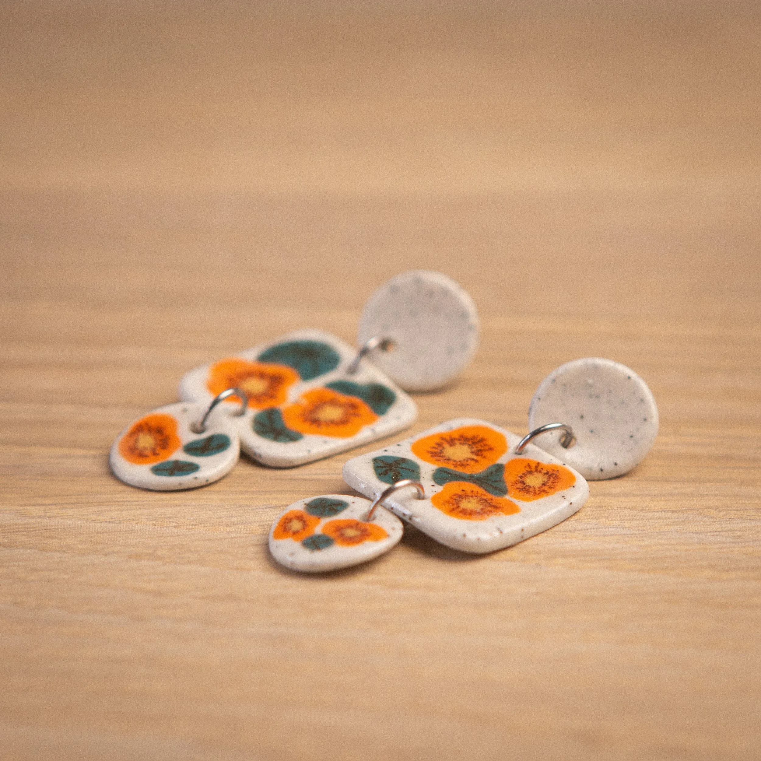 3 tears hand painted earrings with nasturtium flowers, and white circle