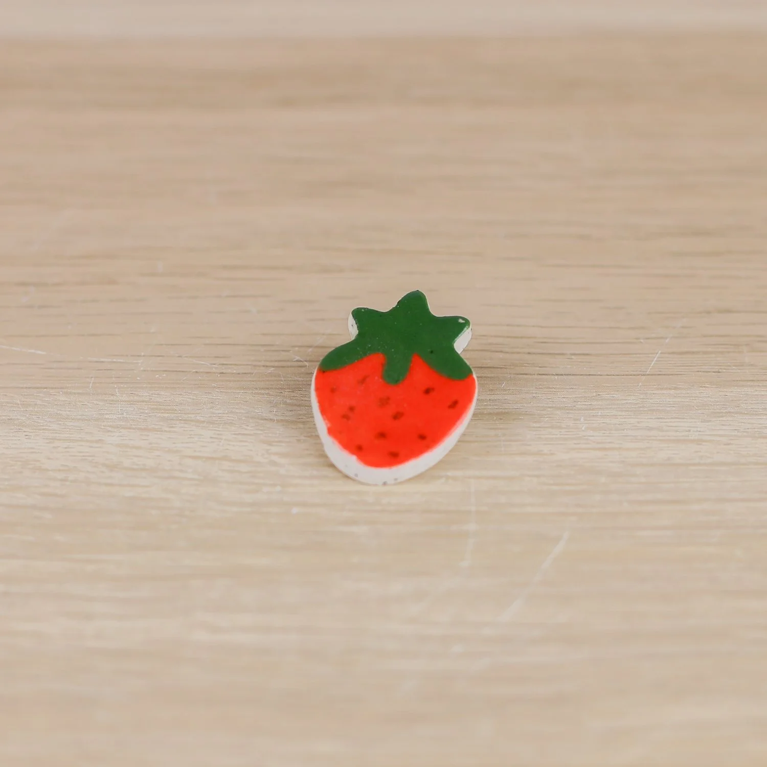 Handmade ceramic red strawberry brooch by hellomae