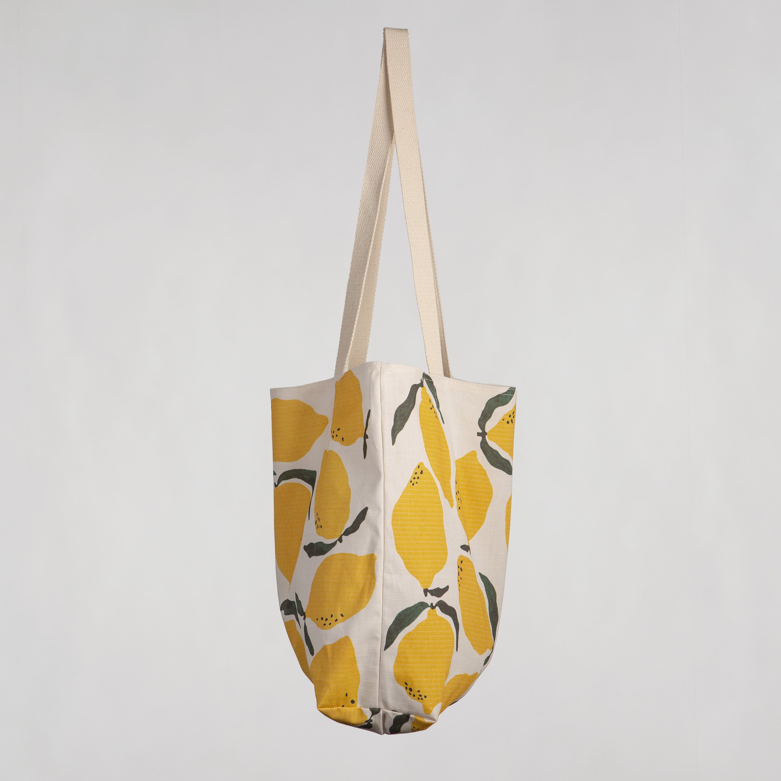 Cotton linen tote bag with a hand-drawn lemon print. Soft, structured, and made in Melbourne.