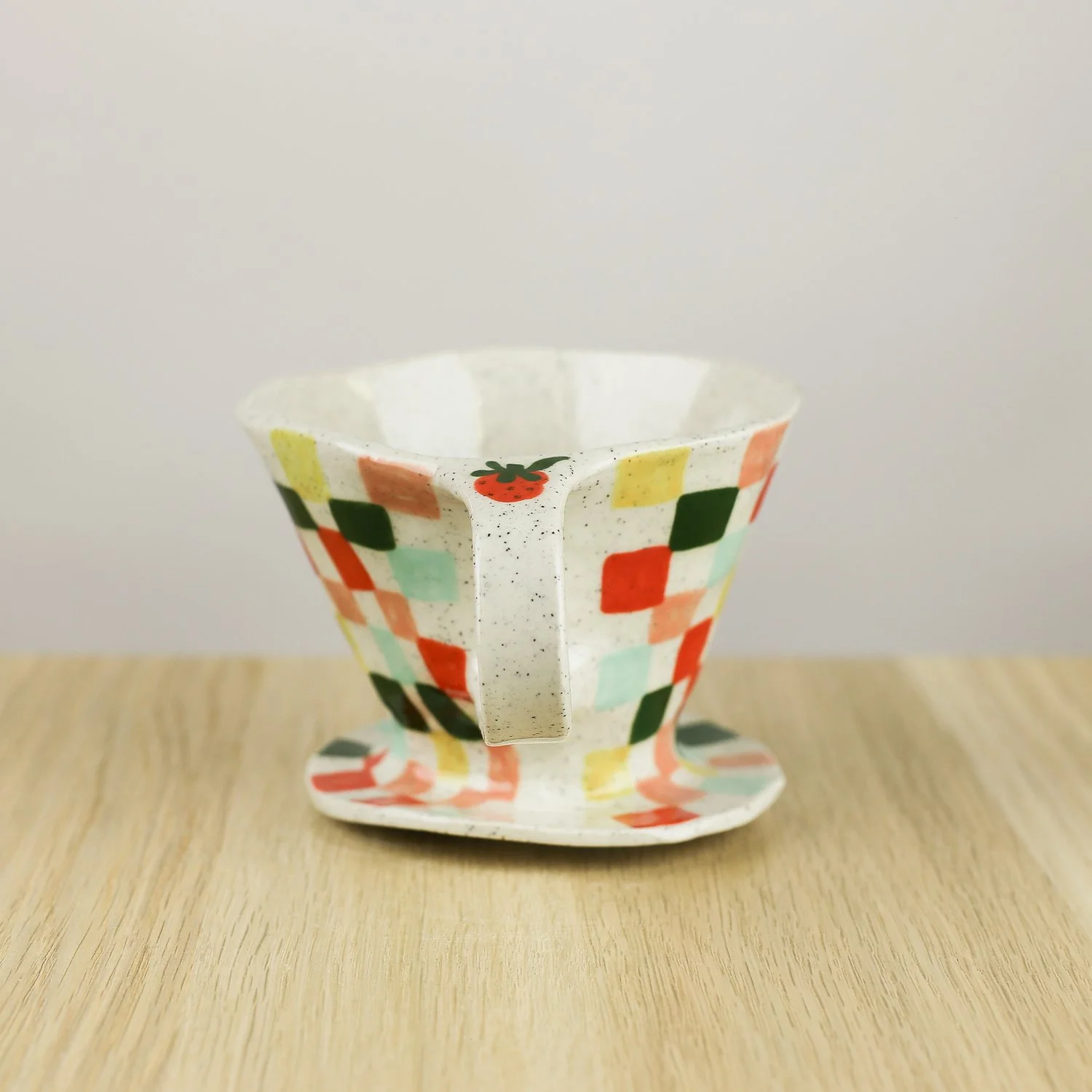 Handmade ceramic coffee dripper with colourful check pattern in red pink yellow and blue, pour over coffee maker by hellomae