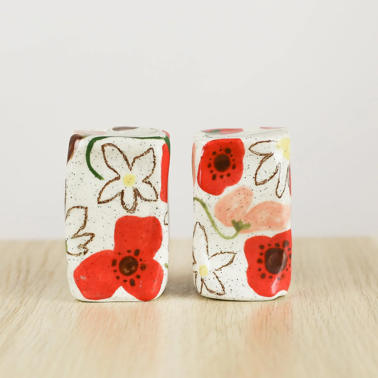 Handmade ceramic salt and pepper shaker set with poppies daisies and sweet pea flowers by hellomae