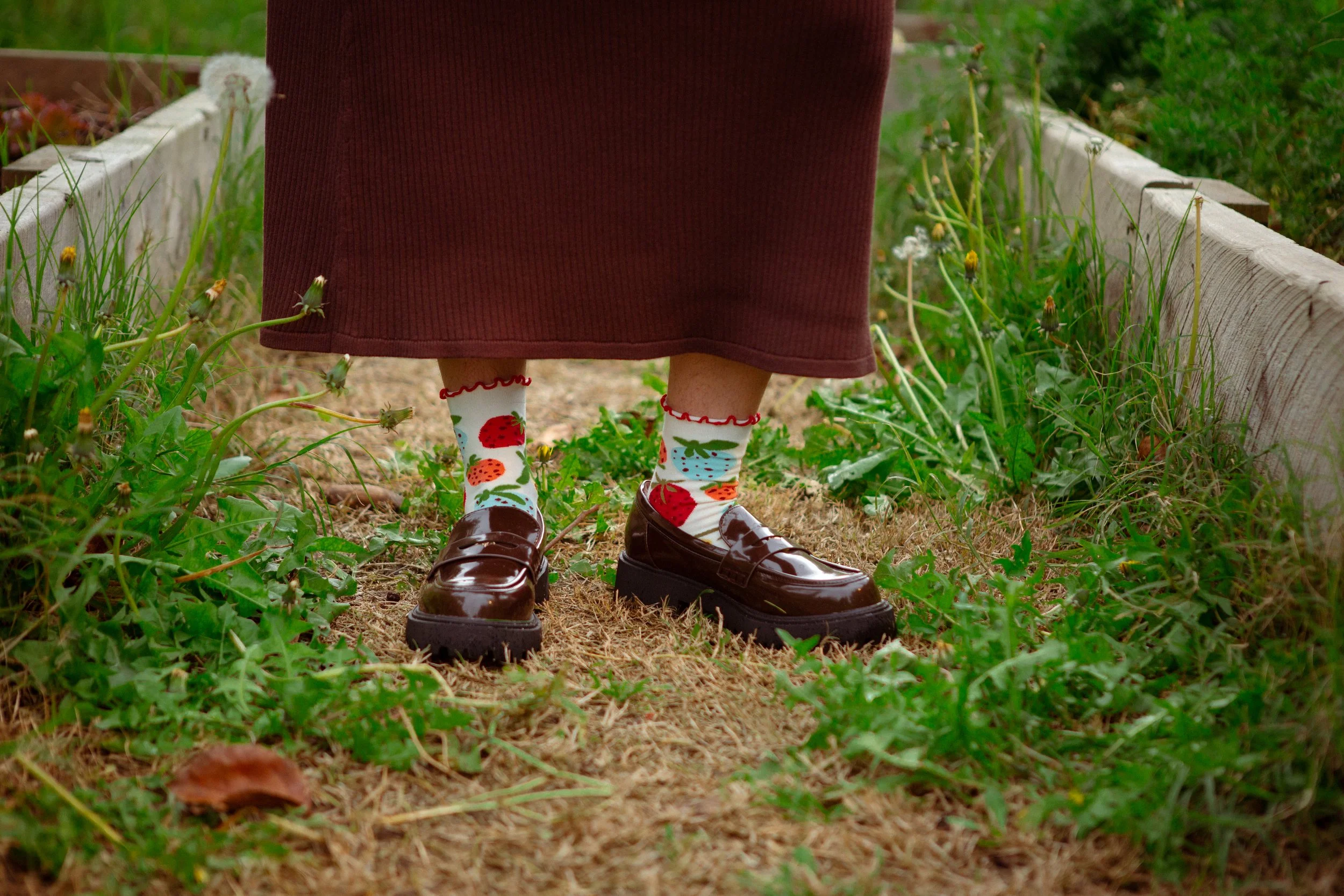 Soft ankle socks featuring the hand-painted Strawberry Dream print and a playful red frill. Comfortable, colourful and perfect for everyday wear.