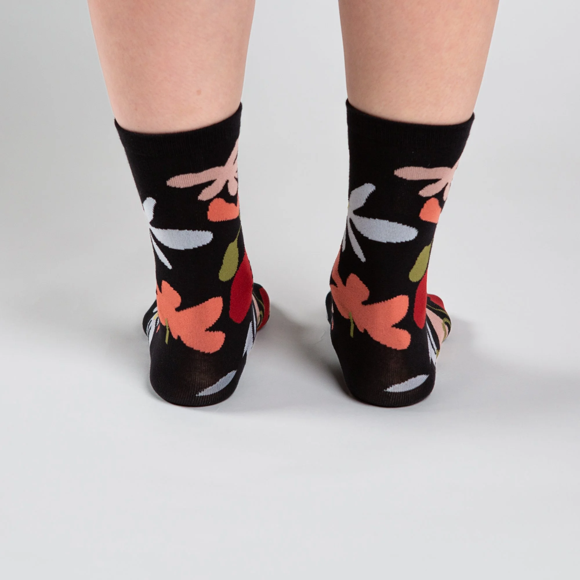 Soft crew socks featuring the hand-painted Flower Daze print. Comfortable, colourful and perfect for adding a playful touch to your everyday wardrobe.