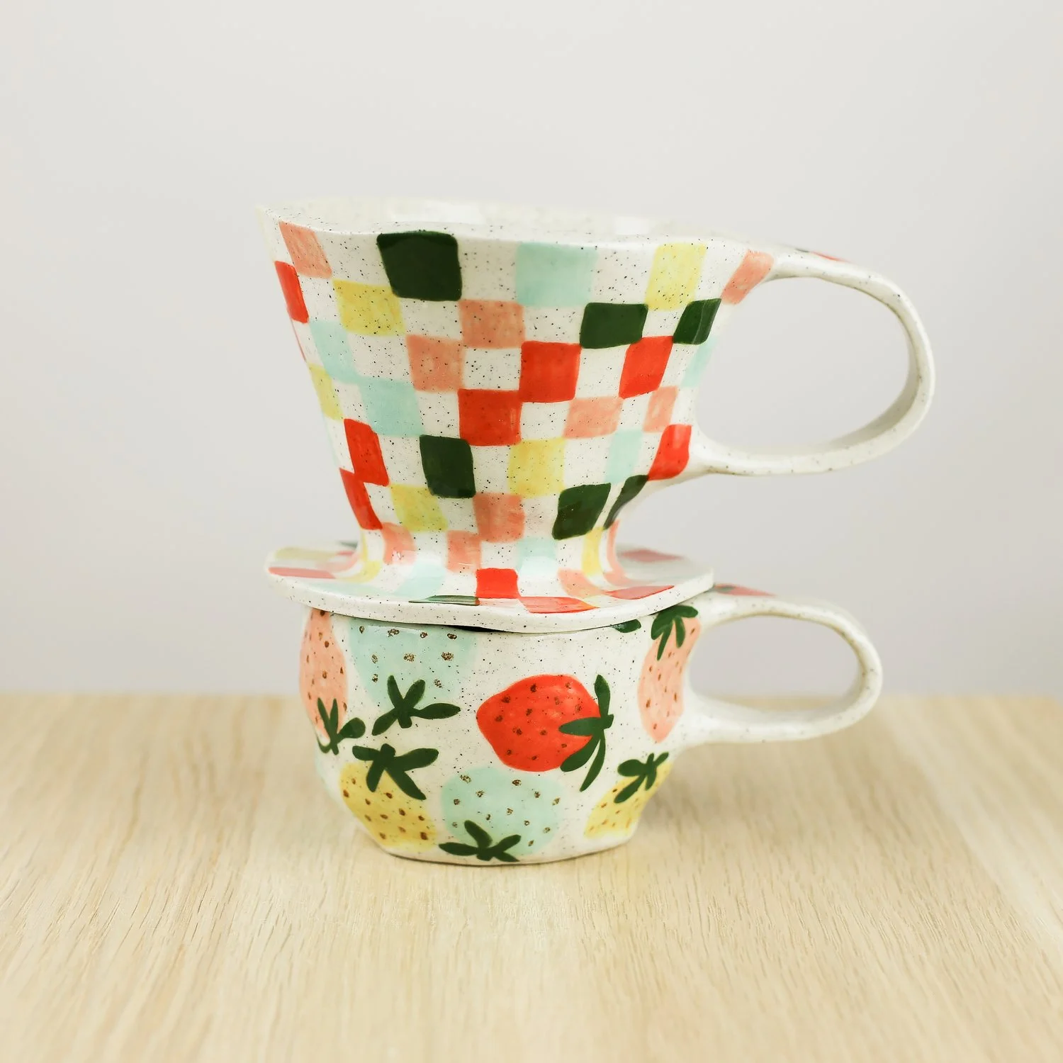 Handmade ceramic coffee dripper with colourful check pattern in red pink yellow and blue, pour over coffee maker by hellomae