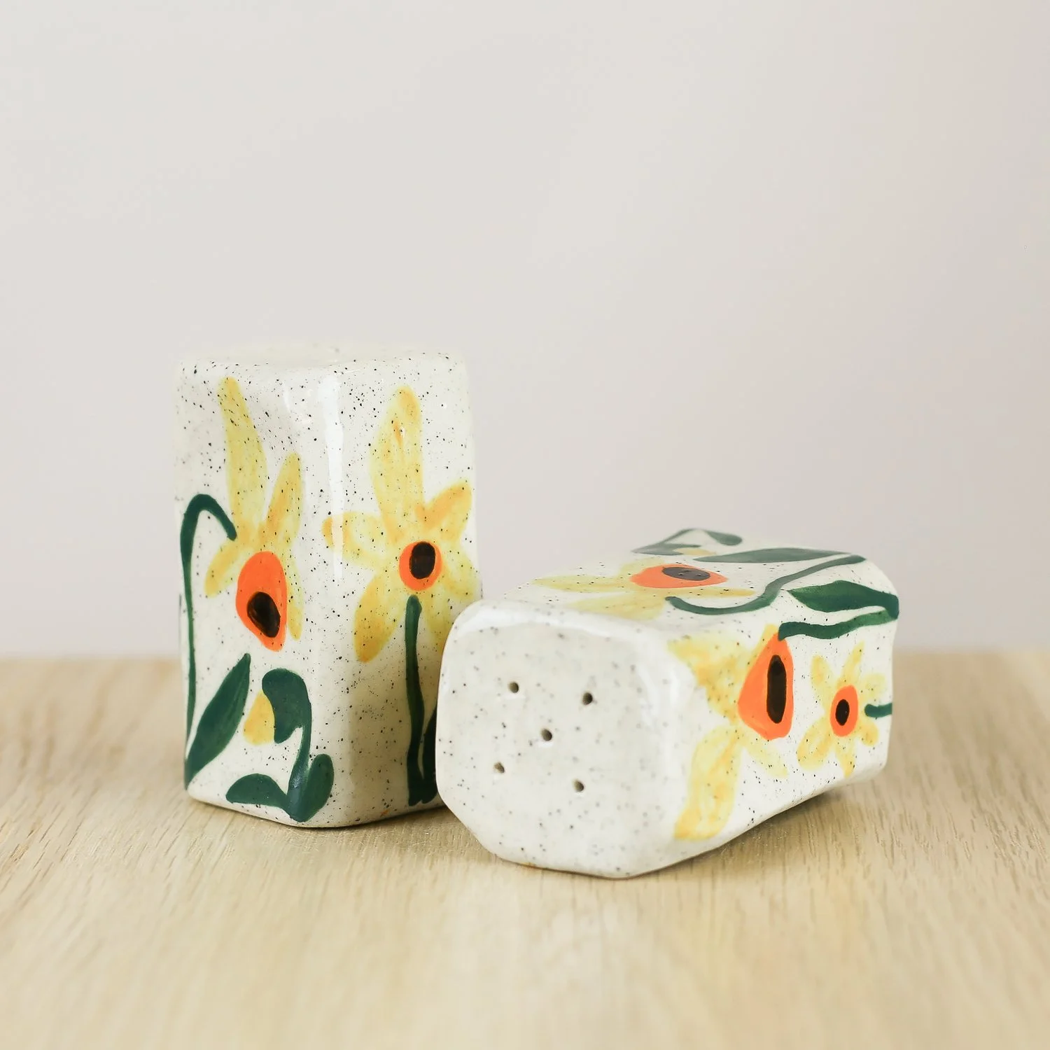 Handmade ceramic salt and pepper shaker set with daffodil flowers by hellomae