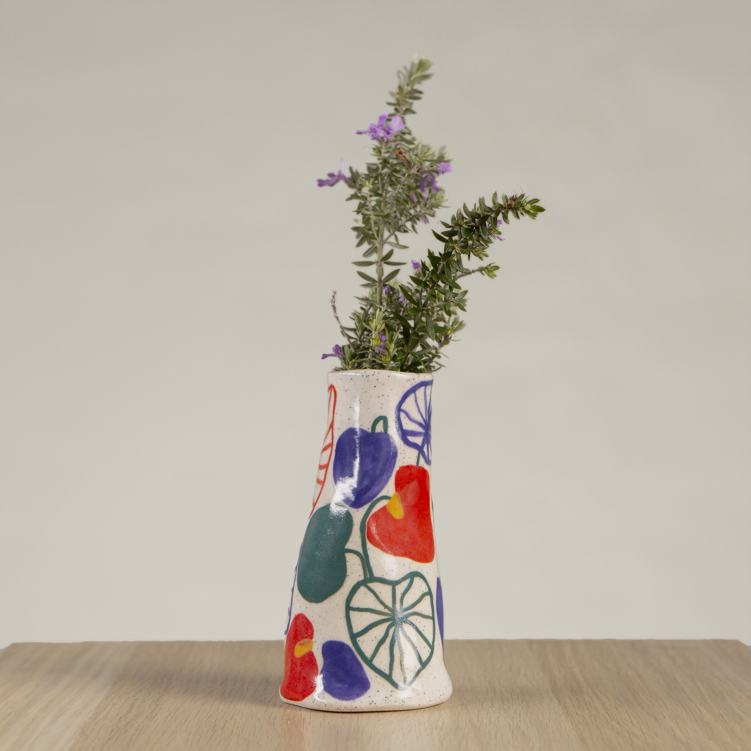 Mini ceramic vase with hand-painted anthurium flower artwork on speckled clay, handmade in Melbourne by hellomaë