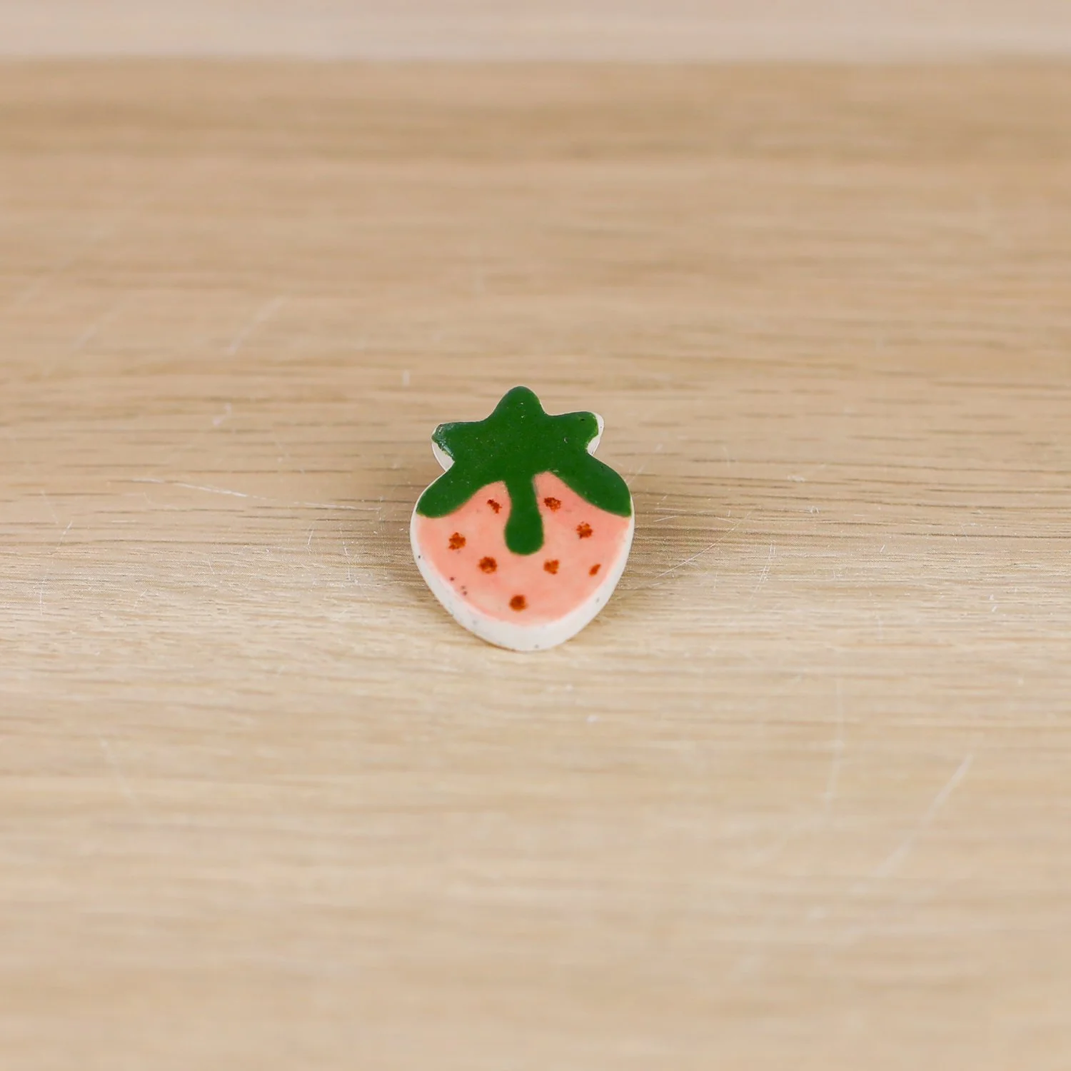 Handmade ceramic pink strawberry brooch by hellomae