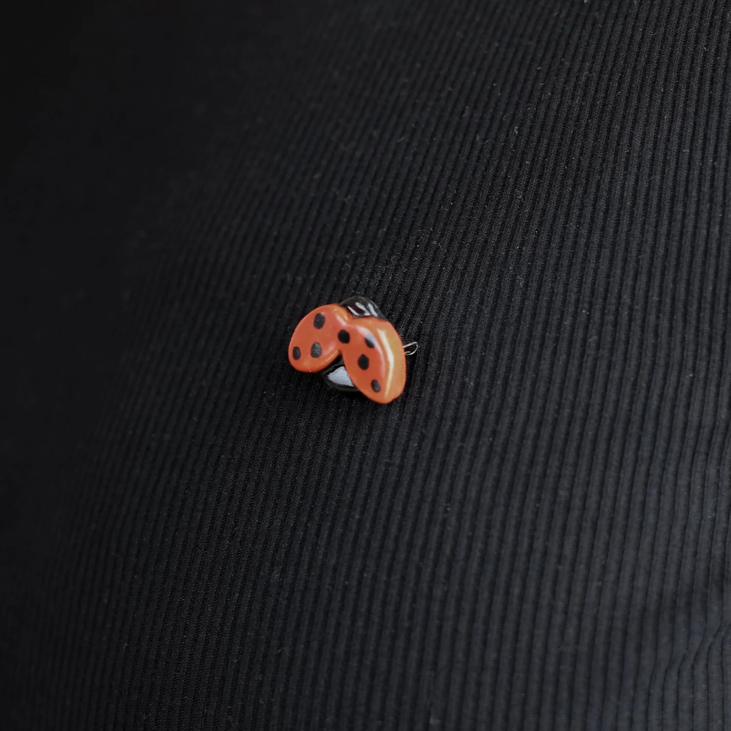 Handmade ceramic ladybug brooch with butterfly clasp backing by hellomae