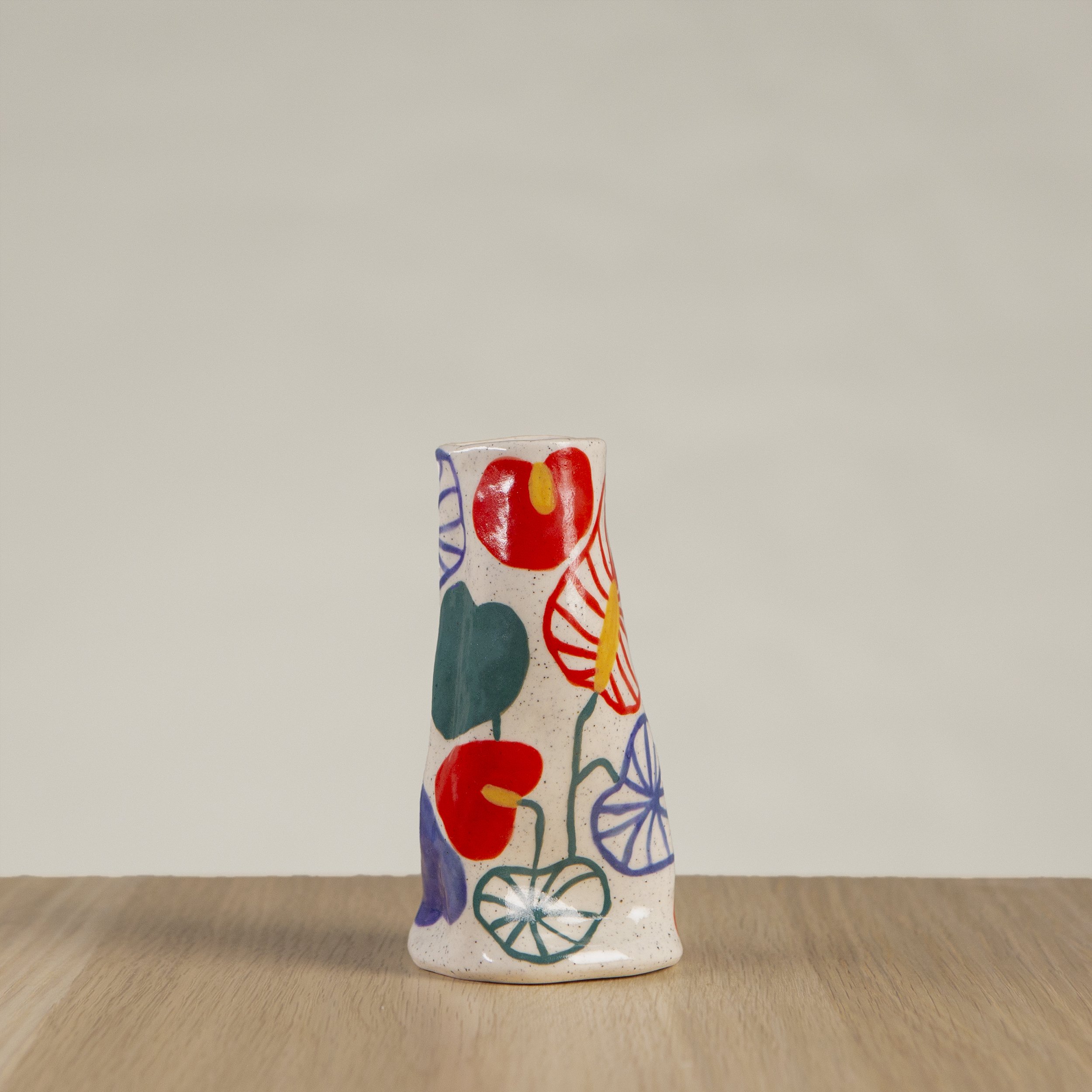 Mini ceramic vase with hand-painted anthurium flower artwork on speckled clay, handmade in Melbourne by hellomaë