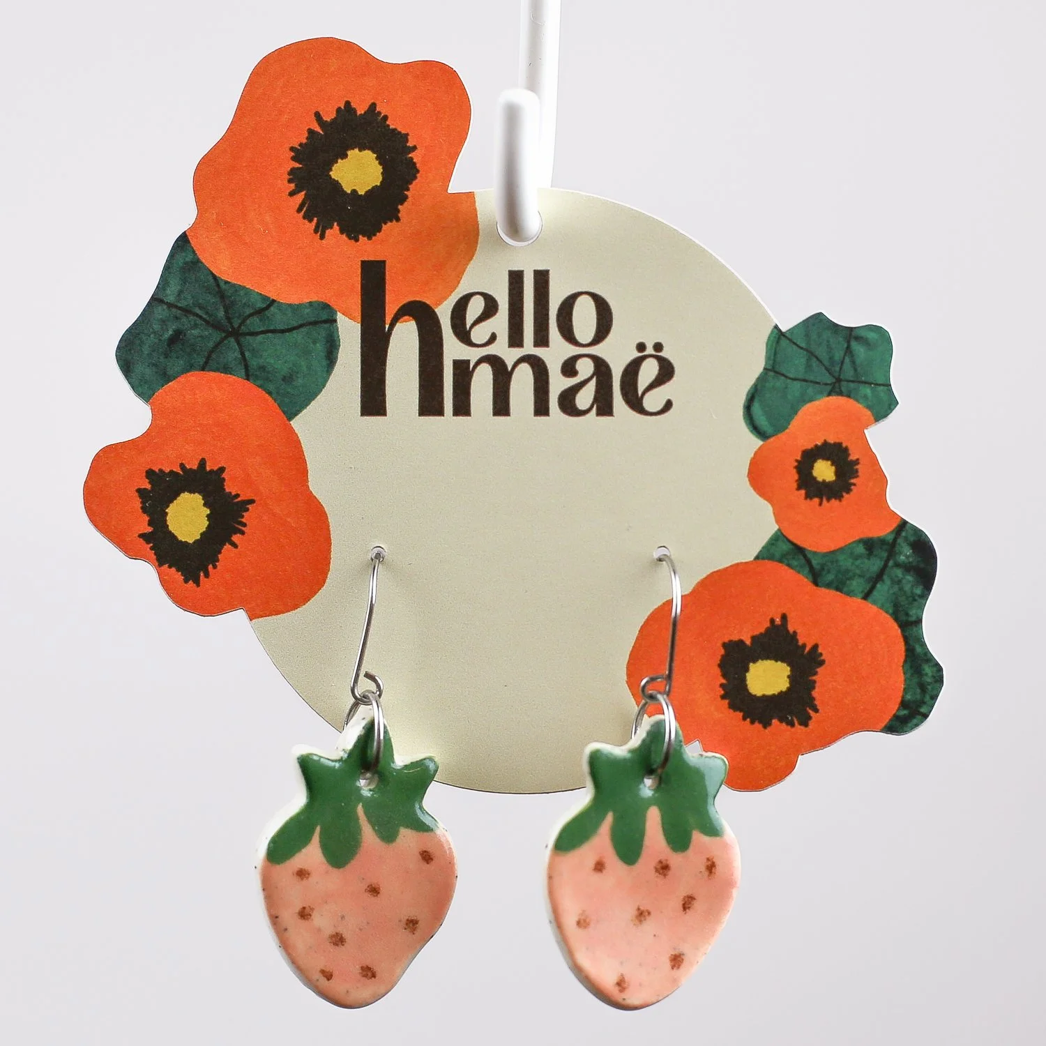 Handmade ceramic strawberry drop earrings in pink with stainless steel hooks by hellome