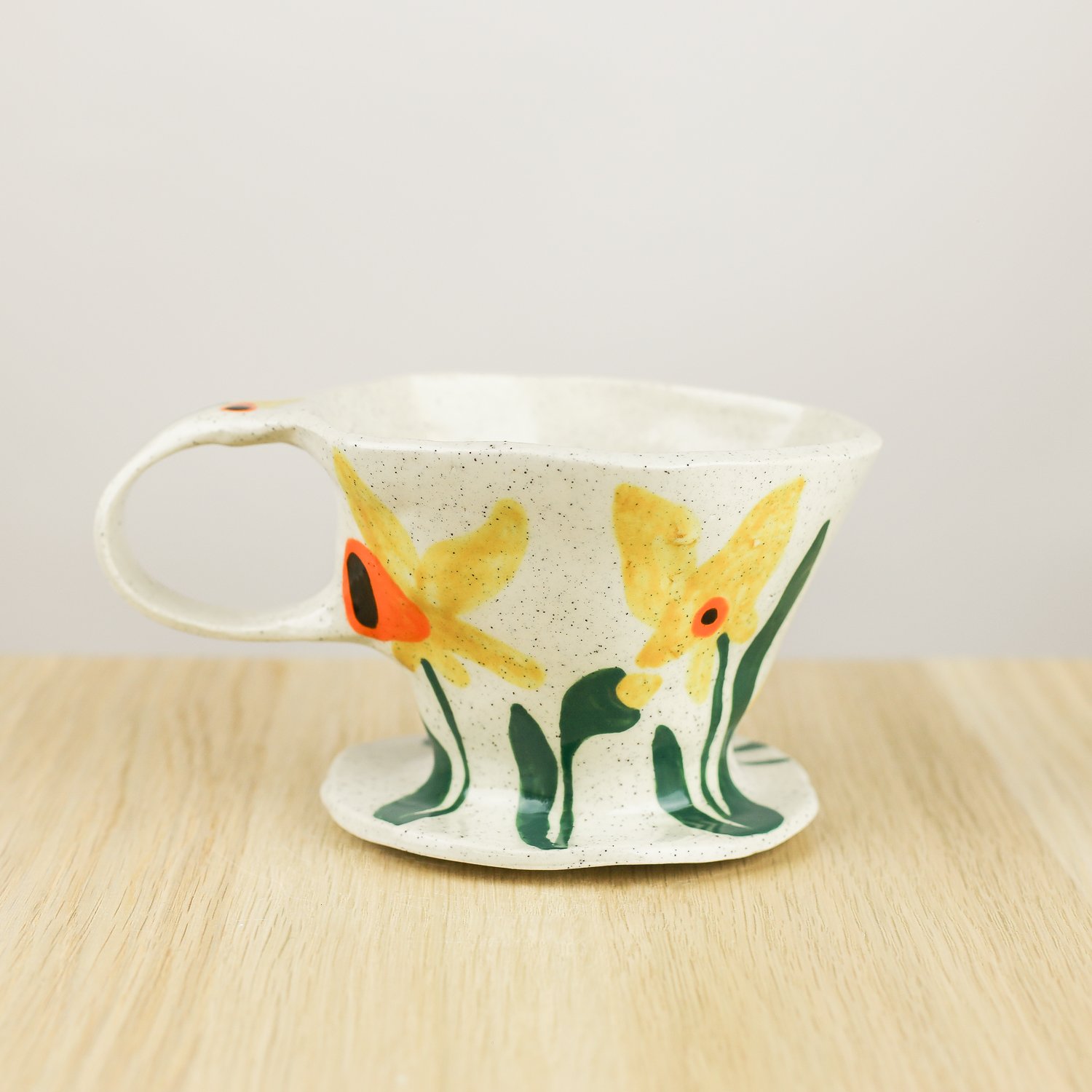 Handmade ceramic coffee dripper with daffodil flowers in yellow and green, pour over coffee maker by hellomae