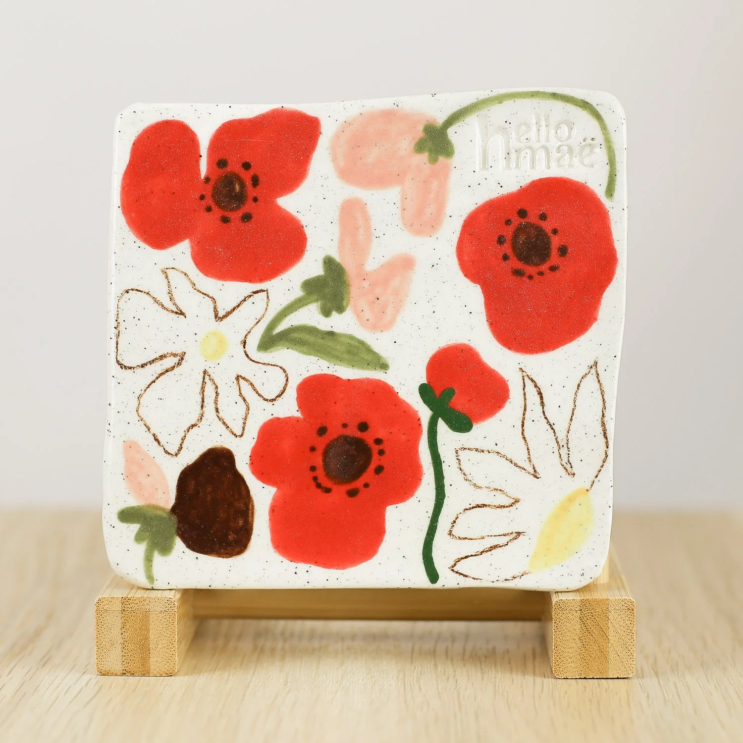 Handmade ceramic coaster with poppies daisies and sweet pea flowers and cork backing, 11cm by hellomae