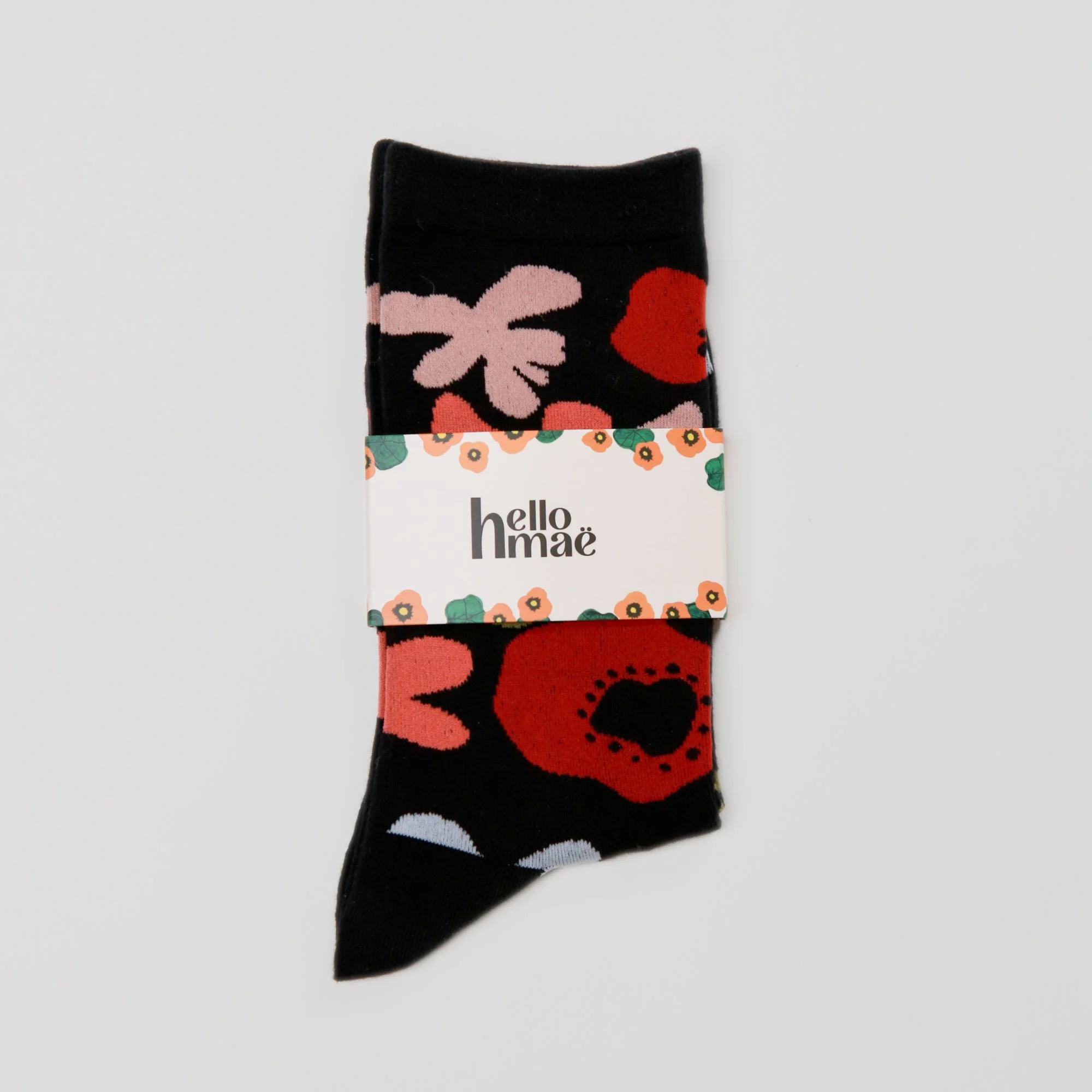 Soft crew socks featuring the hand-painted Flower Daze print. Comfortable, colourful and perfect for adding a playful touch to your everyday wardrobe.