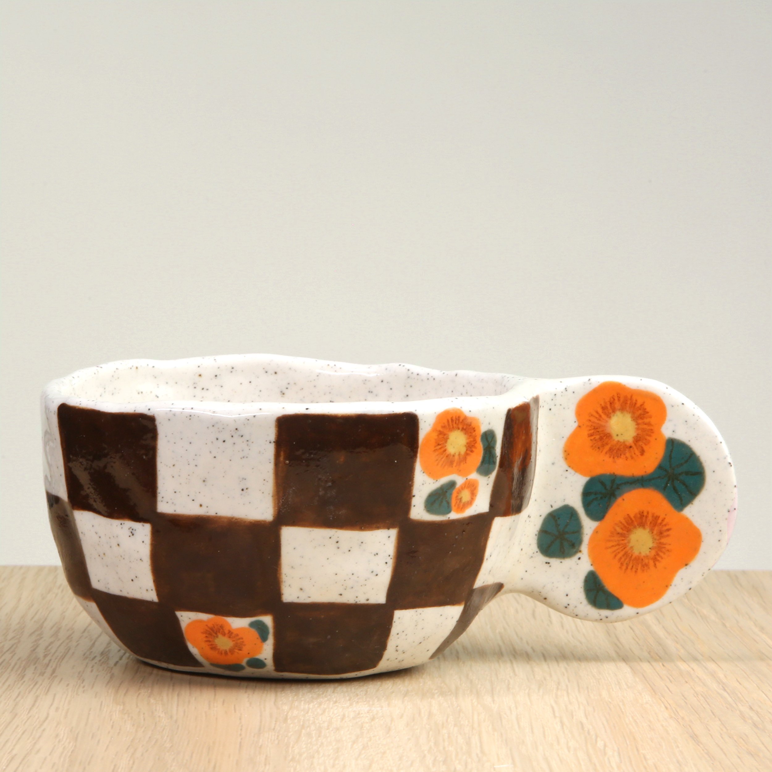 Handmade Ceramic Coffee Cup – Nasturtium flowers & chocolate check, petal handle