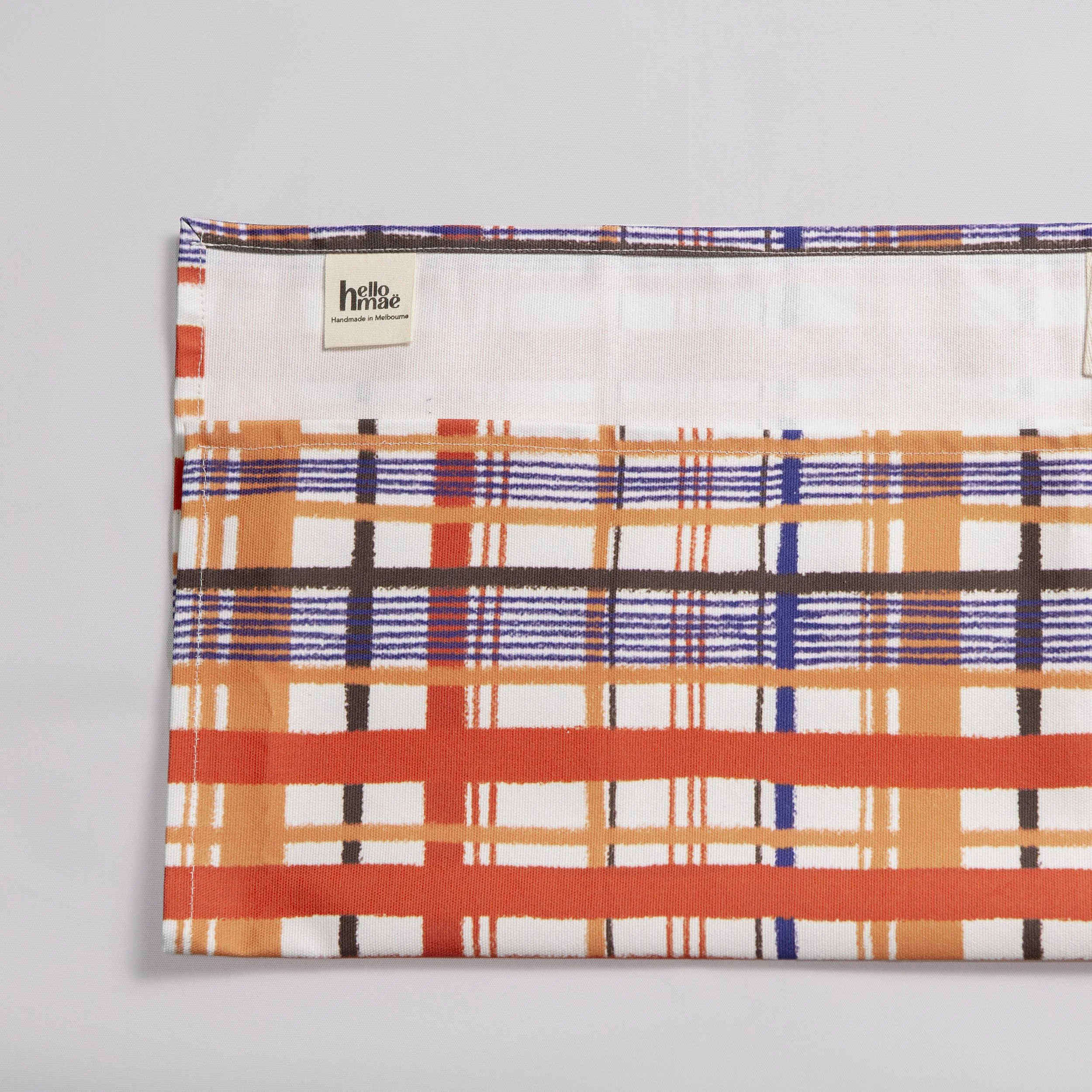 Cotton tea towel featuring a hand-drawn orange/blue/red/chocolate print by hellomaë. digitally printed and made in melbourne