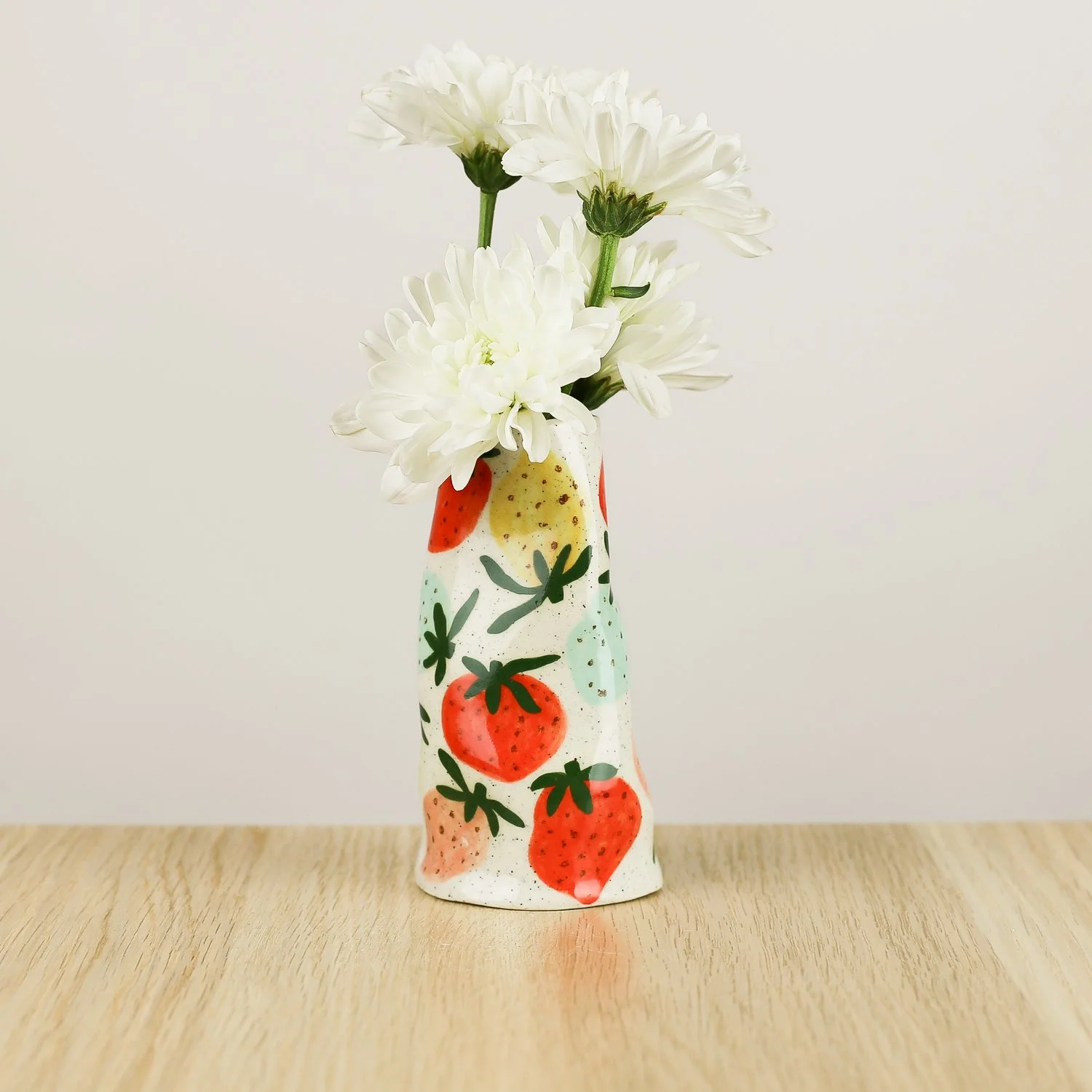 Handmade ceramic mini vase with colourful strawberries, bud vase for single stems by Hello Mae
